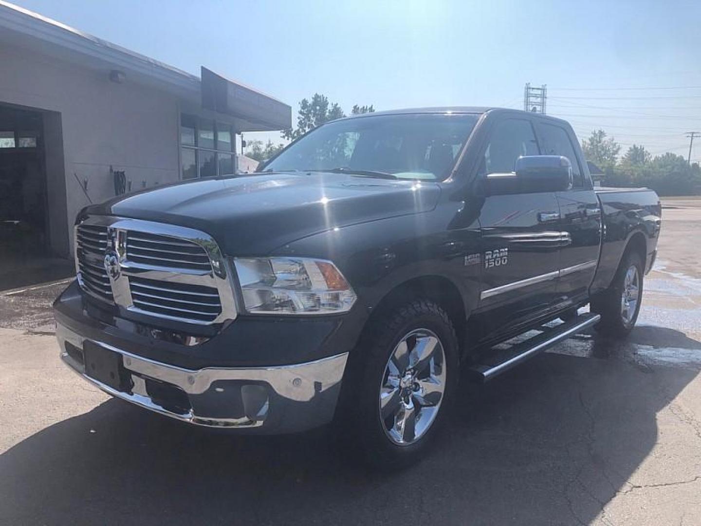 2017 BLACK /GREY RAM 1500 SLT Quad Cab 4WD (1C6RR7GT8HS) with an 5.7L V8 OHV 16V engine, 8A transmission, located at 3304 Woodville Road, Northwood, OH, 43619, (419) 210-8019, 41.612694, -83.480743 - Photo#0