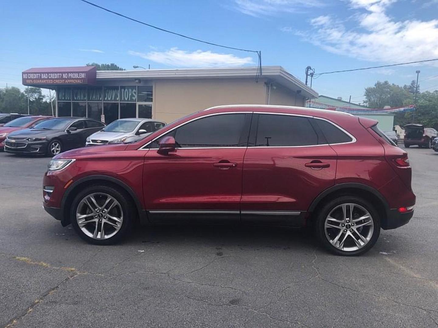 2015 RED /BLACK Lincoln MKC AWD (5LMTJ2AH6FU) with an 2.3L L4 DOHC 16V engine, 6-Speed Automatic transmission, located at 3304 Woodville Road, Northwood, OH, 43619, (419) 210-8019, 41.612694, -83.480743 - We are #1 Auto Loan Dealer for Good Bad or No Credit we have hundreds of vehicles to choose from, stop on in or just fill out our online application to get approved for auto financing and see your credit score for free by visiting our website today. We have Low Payment Options and Terms Available - Photo#1