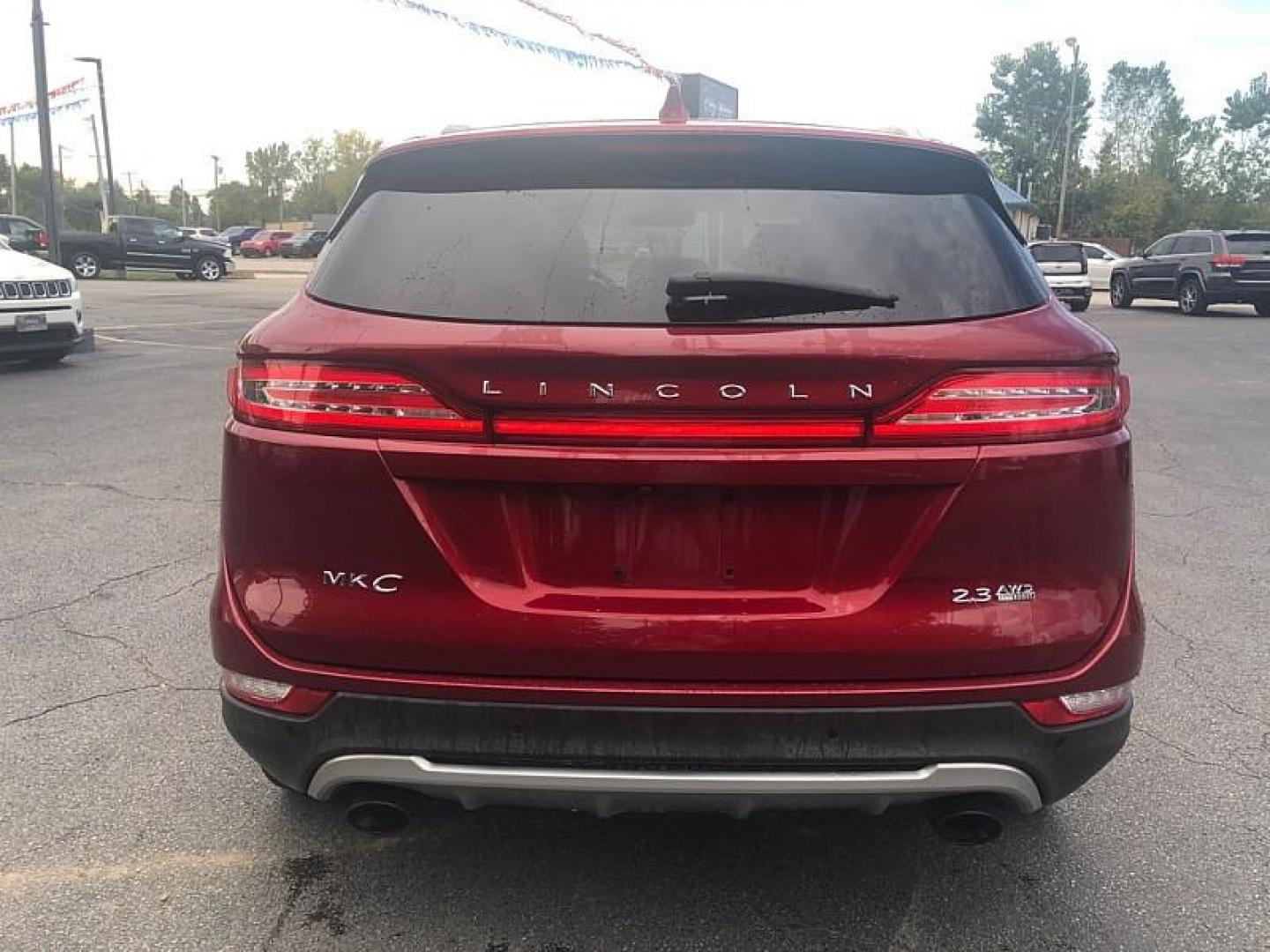 2015 RED /BLACK Lincoln MKC AWD (5LMTJ2AH6FU) with an 2.3L L4 DOHC 16V engine, 6-Speed Automatic transmission, located at 3304 Woodville Road, Northwood, OH, 43619, (419) 210-8019, 41.612694, -83.480743 - We are #1 Auto Loan Dealer for Good Bad or No Credit we have hundreds of vehicles to choose from, stop on in or just fill out our online application to get approved for auto financing and see your credit score for free by visiting our website today. We have Low Payment Options and Terms Available - Photo#3