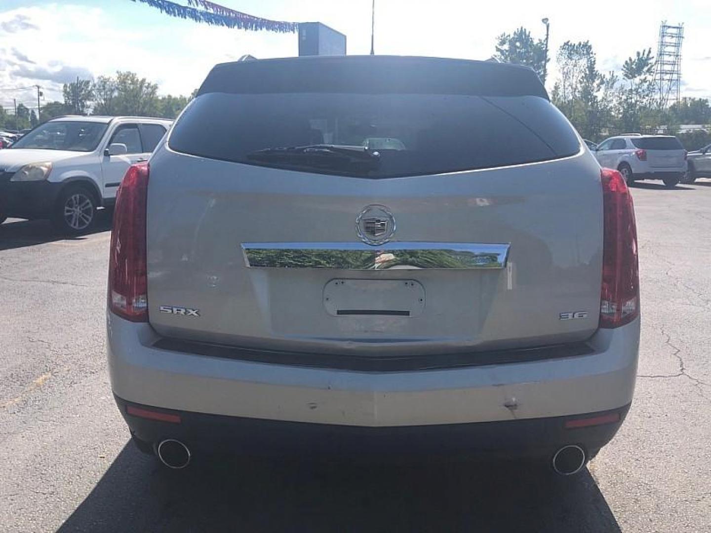 2016 GOLD /BLACK Cadillac SRX Standard FWD (3GYFNAE3XGS) with an 3.6L V6 DOHC 24V FFV engine, 6A transmission, located at 3304 Woodville Road, Northwood, OH, 43619, (419) 210-8019, 41.612694, -83.480743 - We are #1 Auto Loan Dealer for Good Bad or No Credit we have hundreds of vehicles to choose from, stop on in or just fill out our online application to get approved for auto financing and see your credit score for free by visiting our website today. We have Low Payment Options and Terms Available - Photo#3