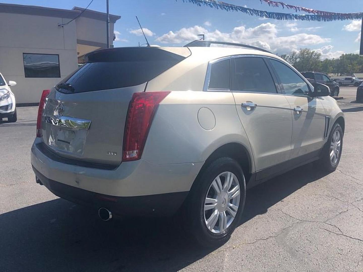 2016 GOLD /BLACK Cadillac SRX Standard FWD (3GYFNAE3XGS) with an 3.6L V6 DOHC 24V FFV engine, 6A transmission, located at 3304 Woodville Road, Northwood, OH, 43619, (419) 210-8019, 41.612694, -83.480743 - We are #1 Auto Loan Dealer for Good Bad or No Credit we have hundreds of vehicles to choose from, stop on in or just fill out our online application to get approved for auto financing and see your credit score for free by visiting our website today. We have Low Payment Options and Terms Available - Photo#4