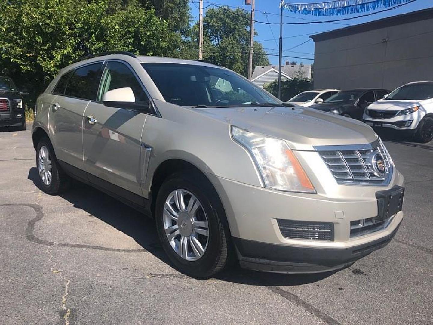 2016 GOLD /BLACK Cadillac SRX Standard FWD (3GYFNAE3XGS) with an 3.6L V6 DOHC 24V FFV engine, 6A transmission, located at 3304 Woodville Road, Northwood, OH, 43619, (419) 210-8019, 41.612694, -83.480743 - We are #1 Auto Loan Dealer for Good Bad or No Credit we have hundreds of vehicles to choose from, stop on in or just fill out our online application to get approved for auto financing and see your credit score for free by visiting our website today. We have Low Payment Options and Terms Available - Photo#6