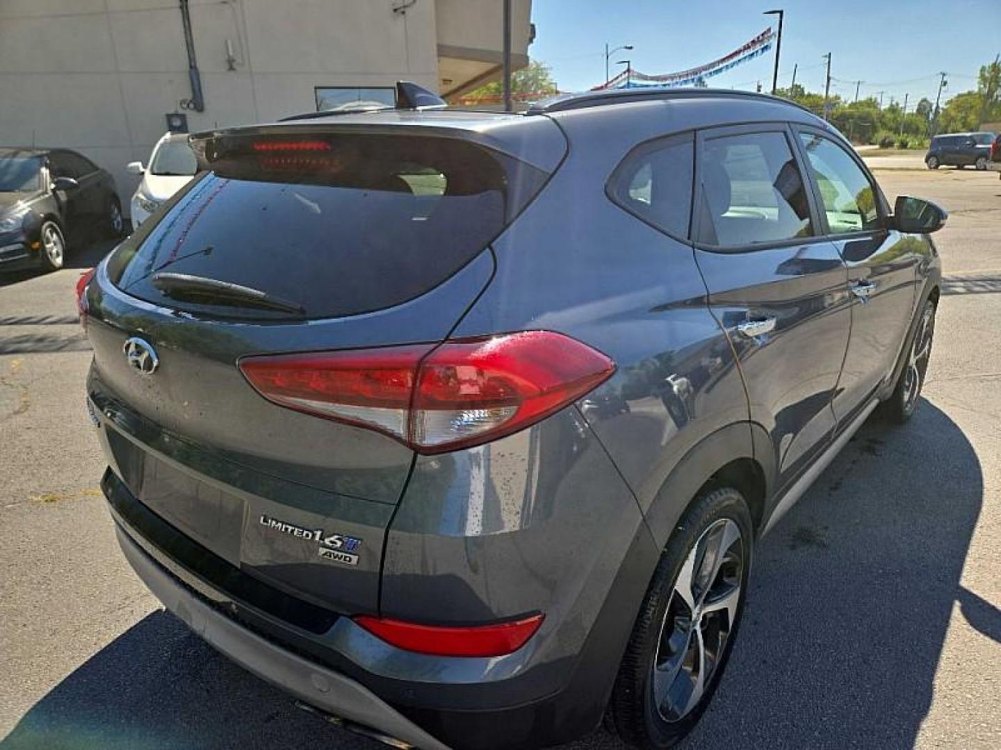 2017 GRAY /BLACK Hyundai Tucson Eco AWD (KM8J3CA2XHU) with an 1.6L L4 DOHC 16V engine, 7A transmission, located at 3304 Woodville Road, Northwood, OH, 43619, (419) 210-8019, 41.612694, -83.480743 - We are #1 Auto Loan Dealer for Good Bad or No Credit we have hundreds of vehicles to choose from, stop on in or just fill out our online application to get approved for auto financing and see your credit score for free by visiting our website today. We have Low Payment Options and Terms Available - Photo#4