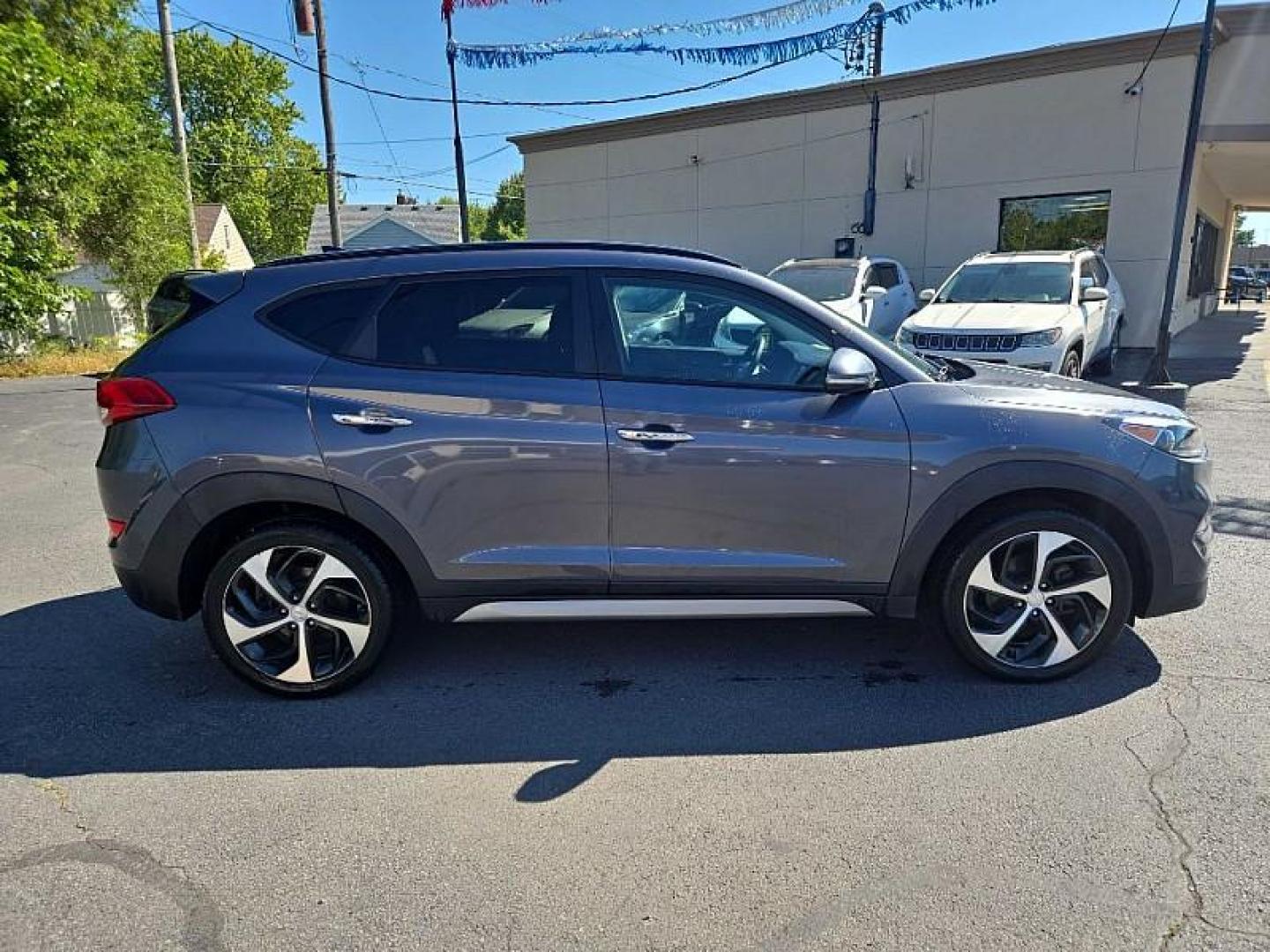 2017 GRAY /BLACK Hyundai Tucson Eco AWD (KM8J3CA2XHU) with an 1.6L L4 DOHC 16V engine, 7A transmission, located at 3304 Woodville Road, Northwood, OH, 43619, (419) 210-8019, 41.612694, -83.480743 - We are #1 Auto Loan Dealer for Good Bad or No Credit we have hundreds of vehicles to choose from, stop on in or just fill out our online application to get approved for auto financing and see your credit score for free by visiting our website today. We have Low Payment Options and Terms Available - Photo#5