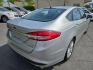 2018 SILVER /BLACK Ford Fusion Hybrid SE (3FA6P0LU9JR) with an 2.0L L4 DOHC 16V HYBRID engine, CVT transmission, located at 3304 Woodville Road, Northwood, OH, 43619, (419) 210-8019, 41.612694, -83.480743 - Your #1 Destination for Auto Loans and mdash;No Matter Your Credit!At our dealership, we cater to everyone and mdash;whether you have good, bad, or no credit. With hundreds of vehicles to choose from, you can easily find the perfect car, truck, or SUV that fits your needs.Get Approved Today!Visit ou - Photo#4