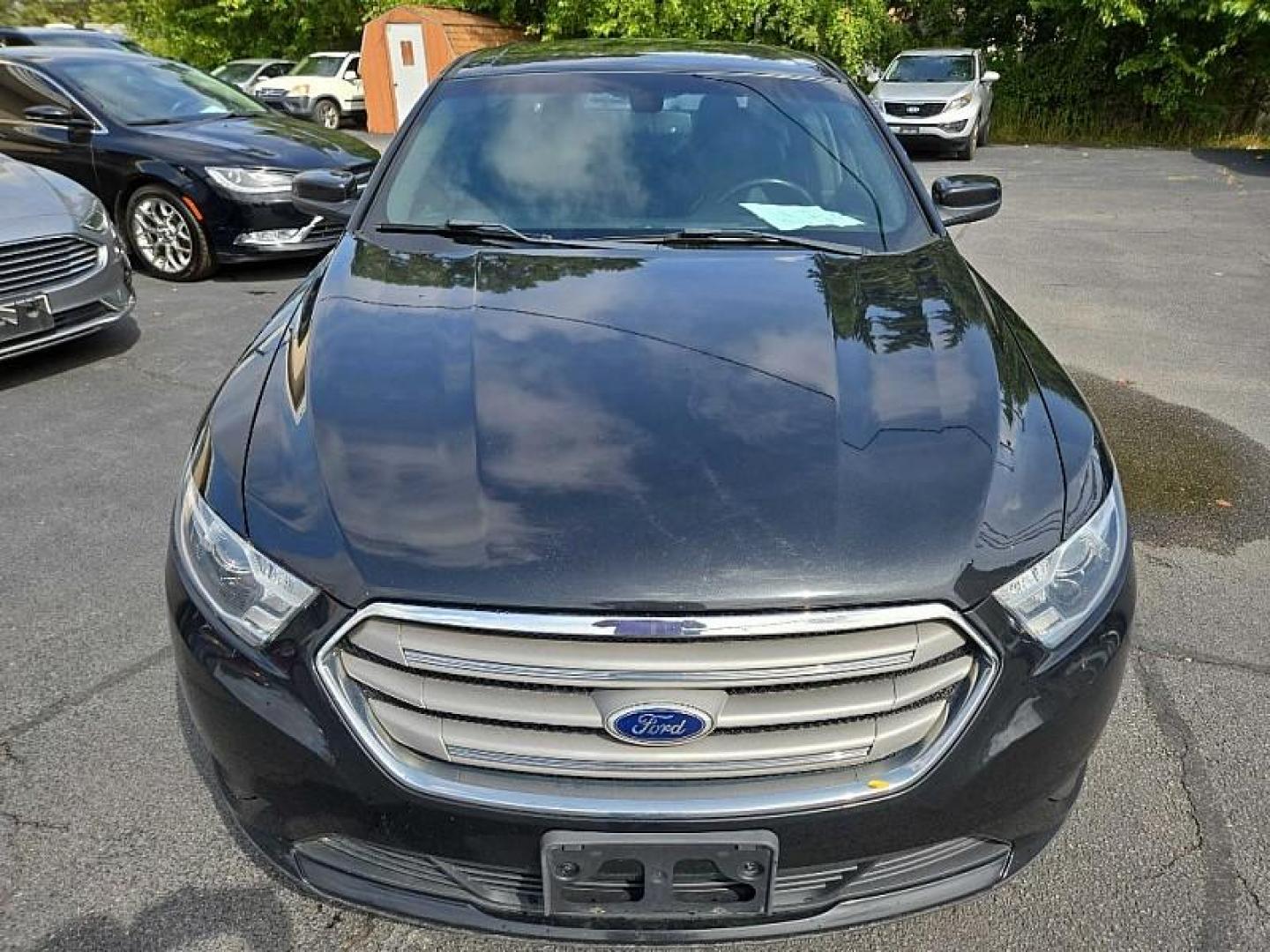 2015 BLACK /BLACK Ford Taurus SEL FWD (1FAHP2E8XFG) with an 3.5L V6 DOHC 24V engine, 6-Speed Automatic transmission, located at 3304 Woodville Road, Northwood, OH, 43619, (419) 210-8019, 41.612694, -83.480743 - We are #1 Auto Loan Dealer for Good Bad or No Credit we have hundreds of vehicles to choose from, stop on in or just fill out our online application to get approved for auto financing and see your credit score for free by visiting our website today. We have Low Payment Options and Terms Available - Photo#7