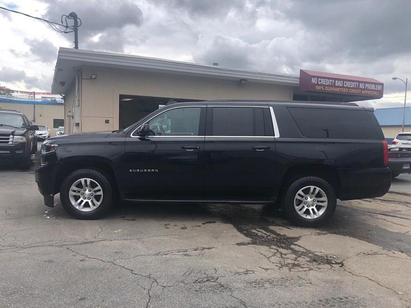 2020 BLACK /BLACK Chevrolet Suburban LS 4WD (1GNSKGKC6LR) with an 5.3L V8 OHV 16V engine, 6A transmission, located at 3304 Woodville Road, Northwood, OH, 43619, (419) 210-8019, 41.612694, -83.480743 - We are #1 Auto Loan Dealer for Good Bad or No Credit we have hundreds of vehicles to choose from, stop on in or just fill out our online application to get approved for auto financing and see your credit score for free by visiting our website today. We have Low Payment Options and Terms Available - Photo#1