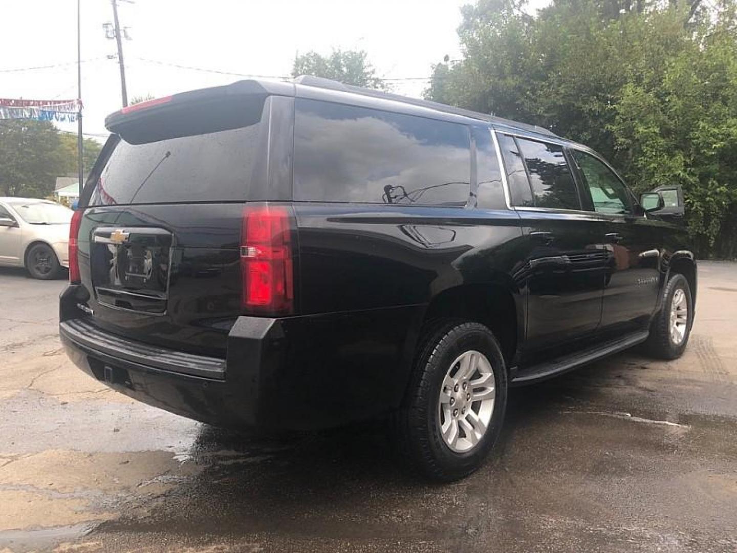 2020 BLACK /BLACK Chevrolet Suburban LS 4WD (1GNSKGKC6LR) with an 5.3L V8 OHV 16V engine, 6A transmission, located at 3304 Woodville Road, Northwood, OH, 43619, (419) 210-8019, 41.612694, -83.480743 - We are #1 Auto Loan Dealer for Good Bad or No Credit we have hundreds of vehicles to choose from, stop on in or just fill out our online application to get approved for auto financing and see your credit score for free by visiting our website today. We have Low Payment Options and Terms Available - Photo#4