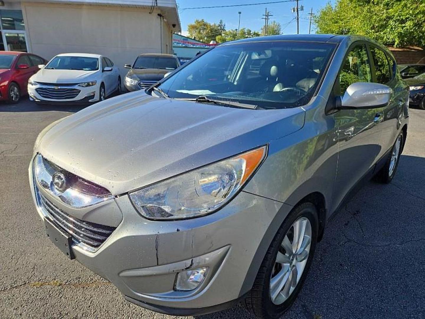 2012 GRAY /BLACK Hyundai Tucson Limited Auto AWD (KM8JUCACXCU) with an 2.4L L4 DOHC 16V engine, 6-Speed Automatic transmission, located at 3304 Woodville Road, Northwood, OH, 43619, (419) 210-8019, 41.612694, -83.480743 - We are #1 Auto Loan Dealer for Good Bad or No Credit we have hundreds of vehicles to choose from, stop on in or just fill out our online application to get approved for auto financing and see your credit score for free by visiting our website today. We have Low Payment Options and Terms Available - Photo#0