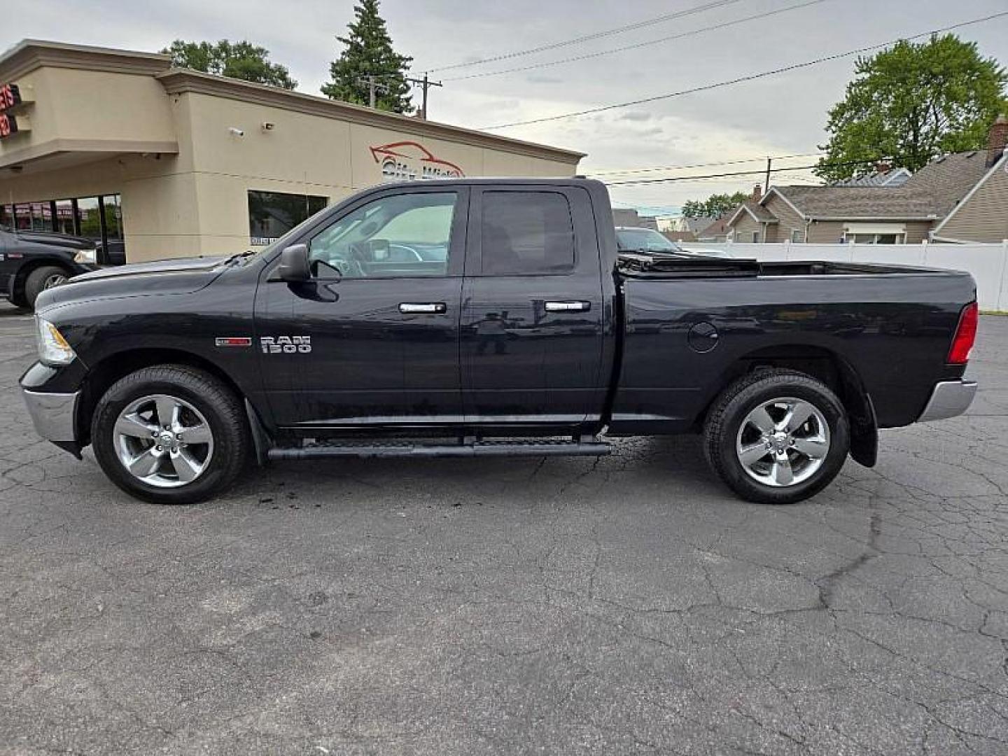 2016 BLACK /GREY RAM 1500 SLT Quad Cab 4WD (1C6RR7GM4GS) with an 3.0L V6 DOHC 24V DIESEL engine, 6A transmission, located at 3304 Woodville Road, Northwood, OH, 43619, (419) 210-8019, 41.612694, -83.480743 - We are #1 Auto Loan Dealer for Good Bad or No Credit we have hundreds of vehicles to choose from, stop on in or just fill out our online application to get approved for auto financing and see your credit score for free by visiting our website today. We have Low Payment Options and Terms Available - Photo#1