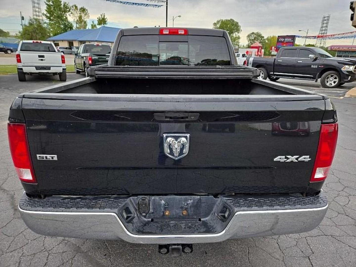 2016 BLACK /GREY RAM 1500 SLT Quad Cab 4WD (1C6RR7GM4GS) with an 3.0L V6 DOHC 24V DIESEL engine, 6A transmission, located at 3304 Woodville Road, Northwood, OH, 43619, (419) 210-8019, 41.612694, -83.480743 - We are #1 Auto Loan Dealer for Good Bad or No Credit we have hundreds of vehicles to choose from, stop on in or just fill out our online application to get approved for auto financing and see your credit score for free by visiting our website today. We have Low Payment Options and Terms Available - Photo#3