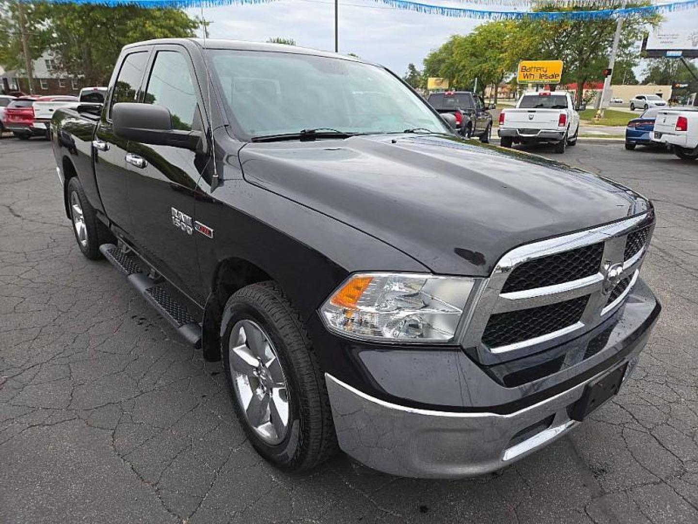 2016 BLACK /GREY RAM 1500 SLT Quad Cab 4WD (1C6RR7GM4GS) with an 3.0L V6 DOHC 24V DIESEL engine, 6A transmission, located at 3304 Woodville Road, Northwood, OH, 43619, (419) 210-8019, 41.612694, -83.480743 - We are #1 Auto Loan Dealer for Good Bad or No Credit we have hundreds of vehicles to choose from, stop on in or just fill out our online application to get approved for auto financing and see your credit score for free by visiting our website today. We have Low Payment Options and Terms Available - Photo#6