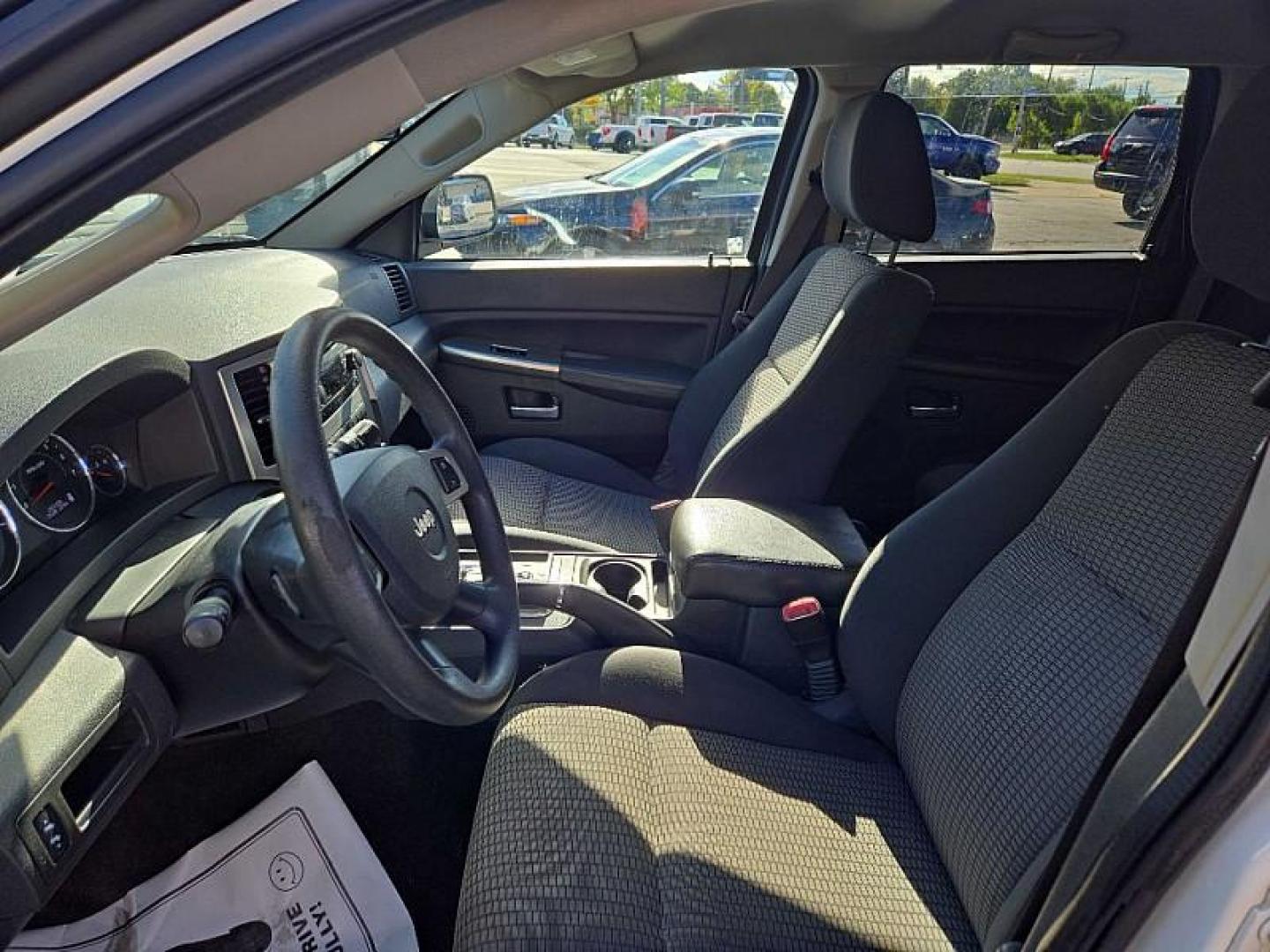 2010 SILVER /BLACK Jeep Grand Cherokee Laredo 4WD (1J4PR4GK6AC) with an 3.7L V6 SOHC 12V engine, 5-Speed Automatic transmission, located at 3304 Woodville Road, Northwood, OH, 43619, (419) 210-8019, 41.612694, -83.480743 - We are #1 Auto Loan Dealer for Good Bad or No Credit we have hundreds of vehicles to choose from, stop on in or just fill out our online application to get approved for auto financing and see your credit score for free by visiting our website today. We have Low Payment Options and Terms Available - Photo#9