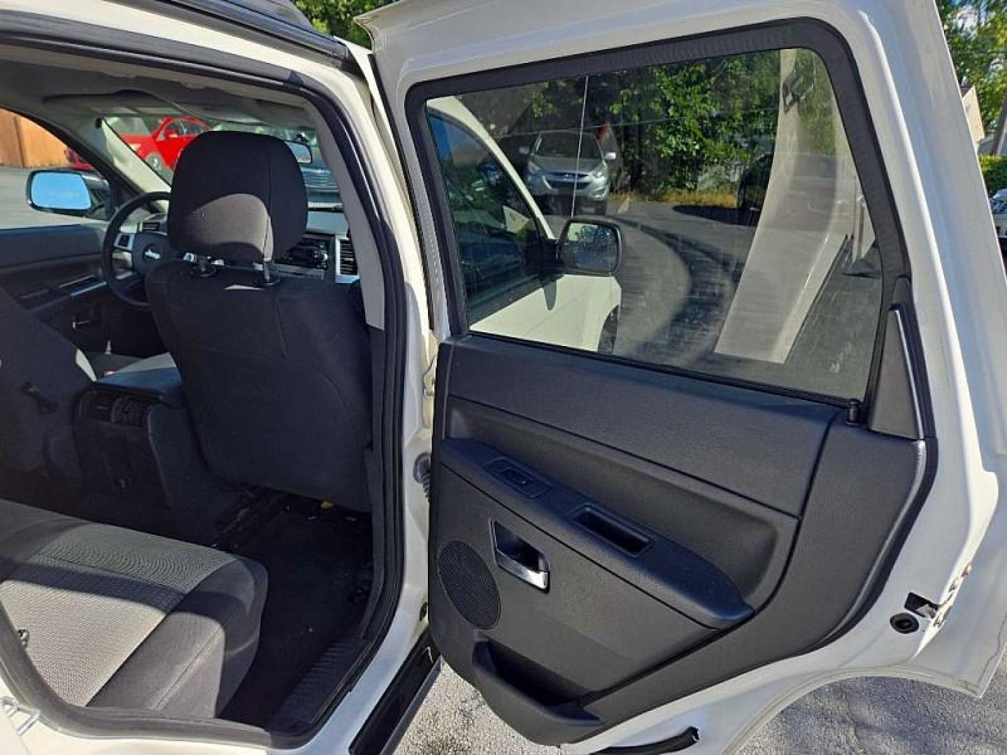 2010 SILVER /BLACK Jeep Grand Cherokee Laredo 4WD (1J4PR4GK6AC) with an 3.7L V6 SOHC 12V engine, 5-Speed Automatic transmission, located at 3304 Woodville Road, Northwood, OH, 43619, (419) 210-8019, 41.612694, -83.480743 - We are #1 Auto Loan Dealer for Good Bad or No Credit we have hundreds of vehicles to choose from, stop on in or just fill out our online application to get approved for auto financing and see your credit score for free by visiting our website today. We have Low Payment Options and Terms Available - Photo#13