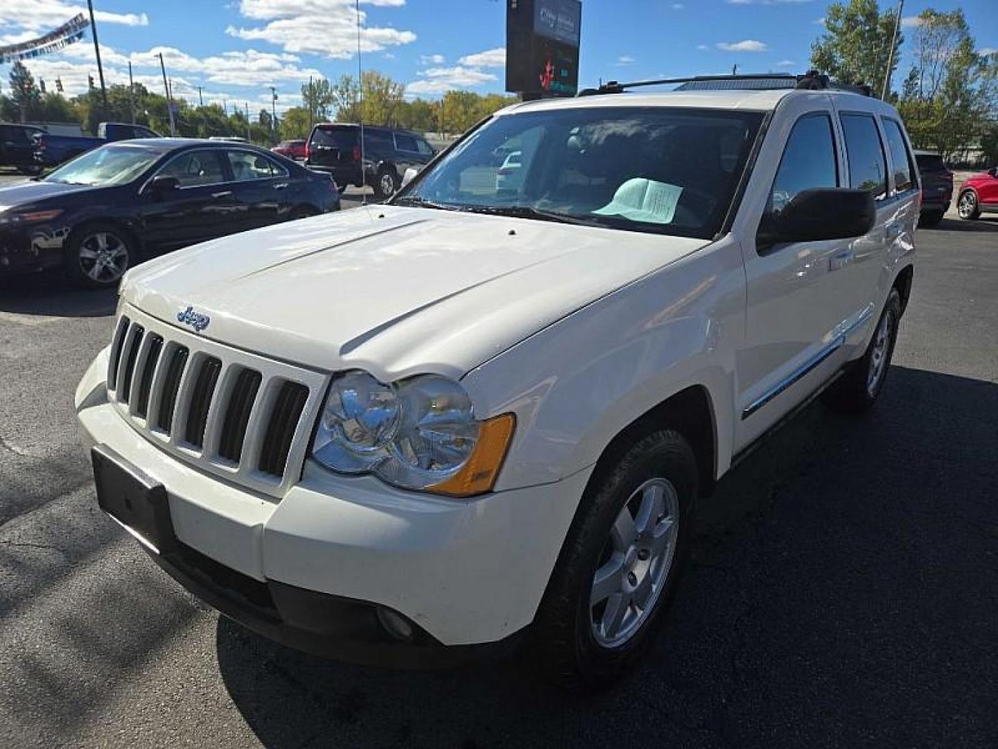 2010 SILVER /BLACK Jeep Grand Cherokee Laredo 4WD (1J4PR4GK6AC) with an 3.7L V6 SOHC 12V engine, 5-Speed Automatic transmission, located at 3304 Woodville Road, Northwood, OH, 43619, (419) 210-8019, 41.612694, -83.480743 - We are #1 Auto Loan Dealer for Good Bad or No Credit we have hundreds of vehicles to choose from, stop on in or just fill out our online application to get approved for auto financing and see your credit score for free by visiting our website today. We have Low Payment Options and Terms Available - Photo#0