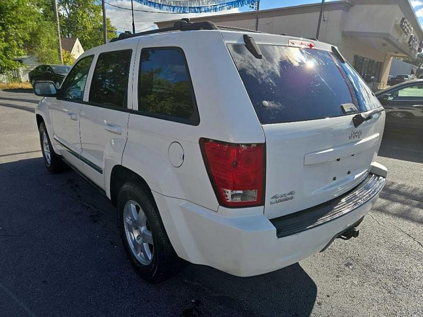 2010 SILVER /BLACK Jeep Grand Cherokee Laredo 4WD (1J4PR4GK6AC) with an 3.7L V6 SOHC 12V engine, 5-Speed Automatic transmission, located at 3304 Woodville Road, Northwood, OH, 43619, (419) 210-8019, 41.612694, -83.480743 - We are #1 Auto Loan Dealer for Good Bad or No Credit we have hundreds of vehicles to choose from, stop on in or just fill out our online application to get approved for auto financing and see your credit score for free by visiting our website today. We have Low Payment Options and Terms Available - Photo#2