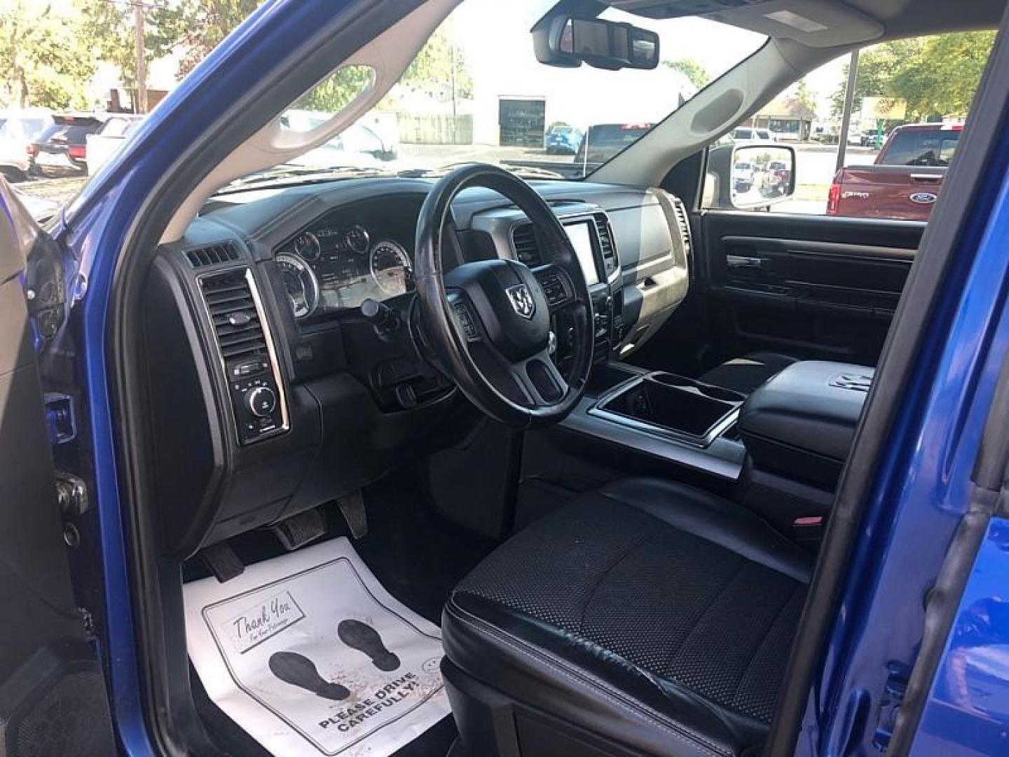 2014 BLUE /BLACK RAM 1500 Sport Quad Cab 4WD (1C6RR7HT9ES) with an 5.7L V8 OHV 16V engine, 6-Speed Automatic transmission, located at 3304 Woodville Road, Northwood, OH, 43619, (419) 210-8019, 41.612694, -83.480743 - We are #1 Auto Loan Dealer for Good Bad or No Credit we have hundreds of vehicles to choose from, stop on in or just fill out our online application to get approved for auto financing and see your credit score for free by visiting our website today. We have Low Payment Options and Terms Available - Photo#19