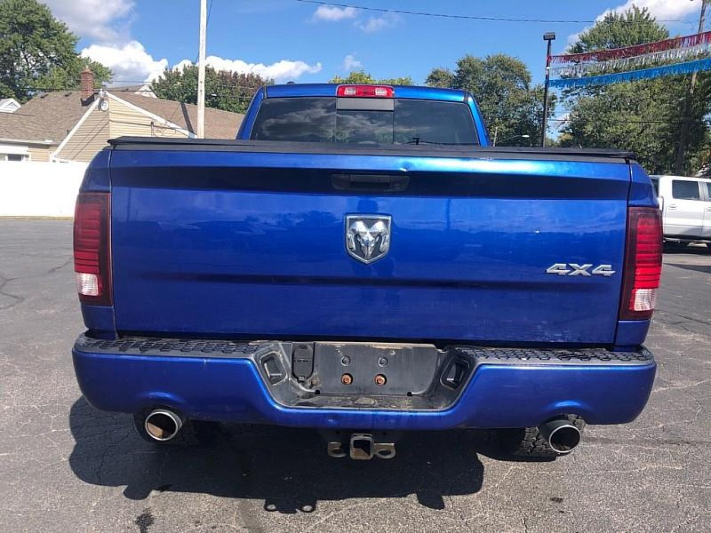 2014 BLUE /BLACK RAM 1500 Sport Quad Cab 4WD (1C6RR7HT9ES) with an 5.7L V8 OHV 16V engine, 6-Speed Automatic transmission, located at 3304 Woodville Road, Northwood, OH, 43619, (419) 210-8019, 41.612694, -83.480743 - We are #1 Auto Loan Dealer for Good Bad or No Credit we have hundreds of vehicles to choose from, stop on in or just fill out our online application to get approved for auto financing and see your credit score for free by visiting our website today. We have Low Payment Options and Terms Available - Photo#3