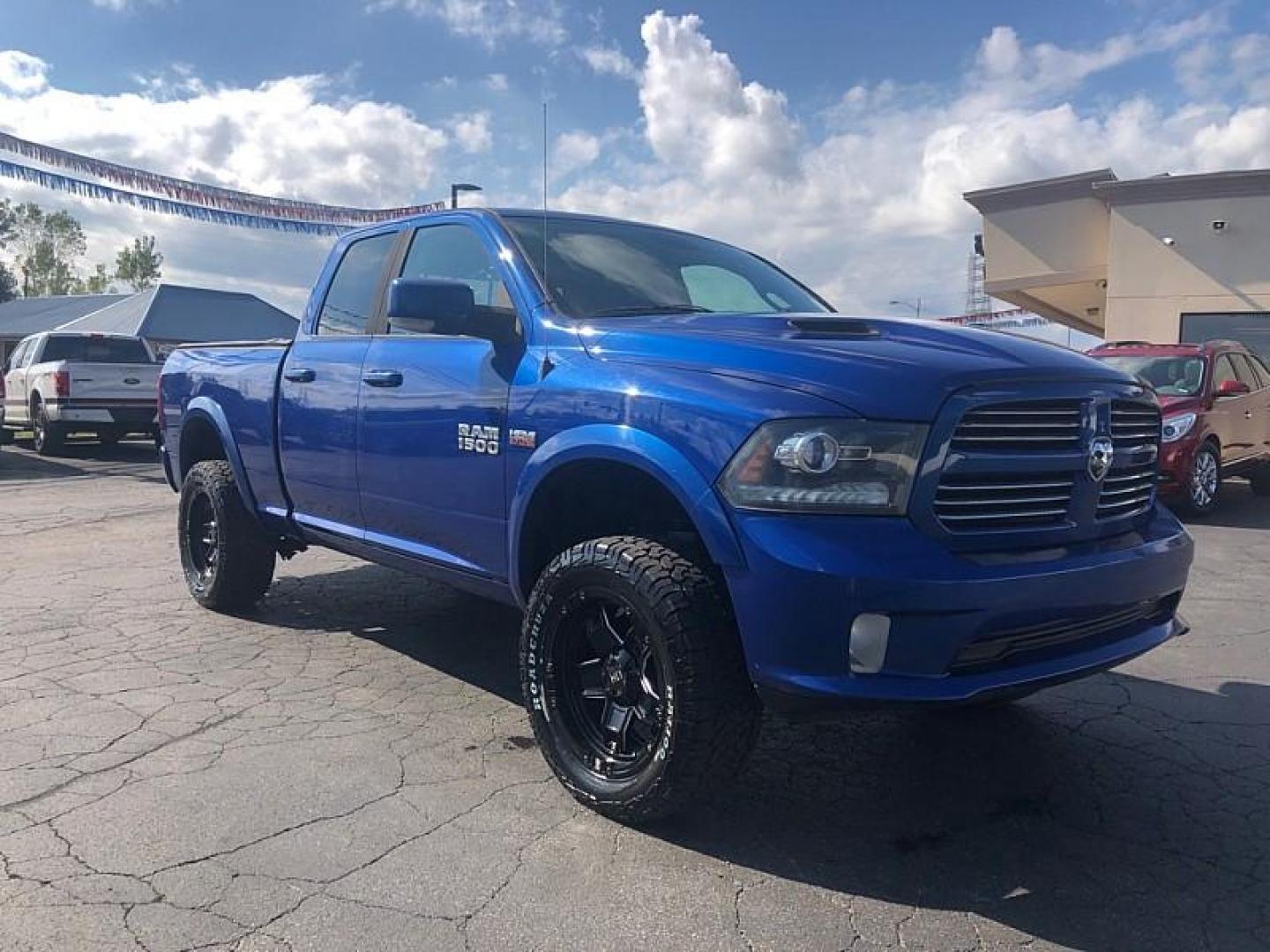 2014 BLUE /BLACK RAM 1500 Sport Quad Cab 4WD (1C6RR7HT9ES) with an 5.7L V8 OHV 16V engine, 6-Speed Automatic transmission, located at 3304 Woodville Road, Northwood, OH, 43619, (419) 210-8019, 41.612694, -83.480743 - We are #1 Auto Loan Dealer for Good Bad or No Credit we have hundreds of vehicles to choose from, stop on in or just fill out our online application to get approved for auto financing and see your credit score for free by visiting our website today. We have Low Payment Options and Terms Available - Photo#6