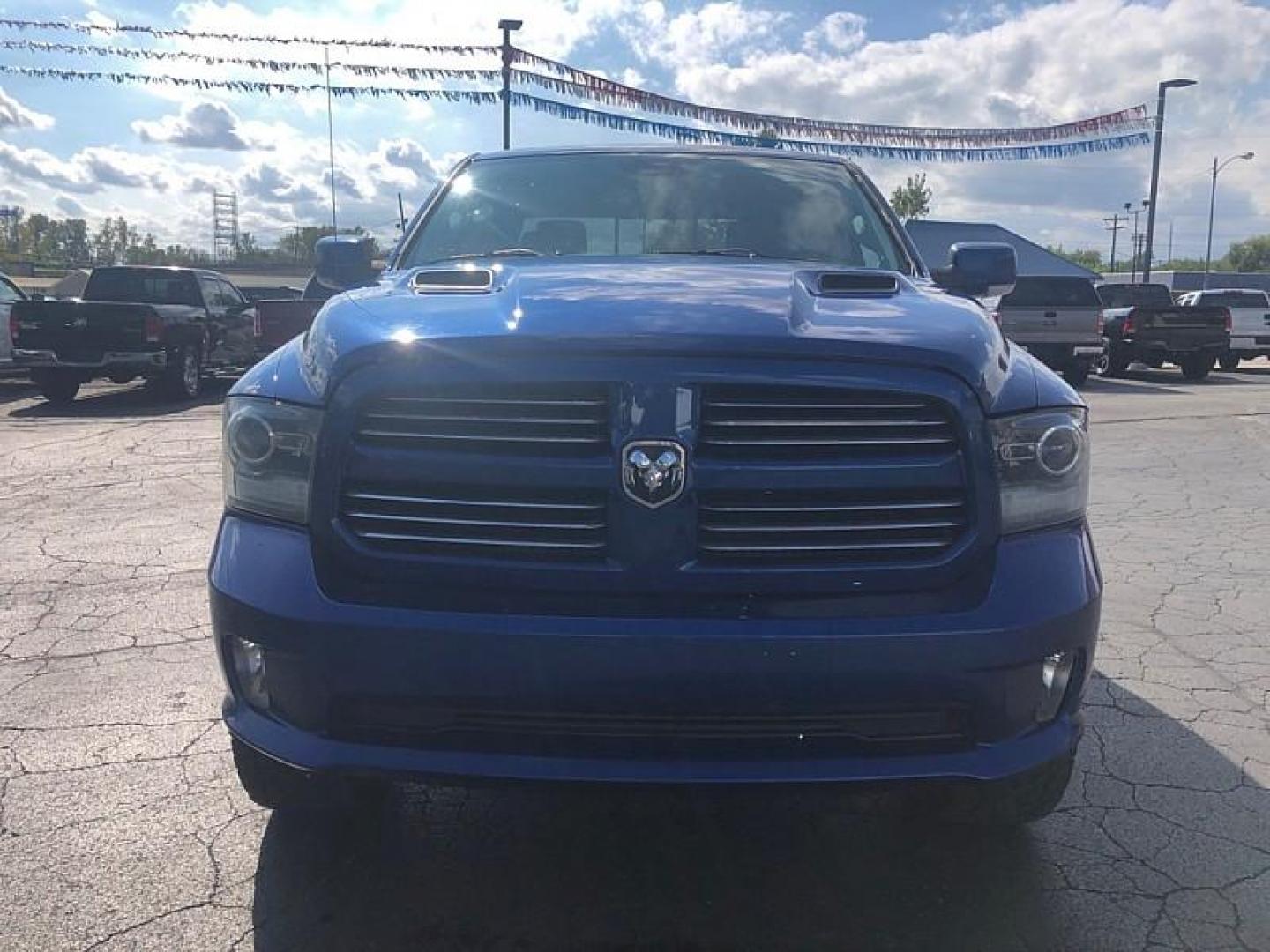 2014 BLUE /BLACK RAM 1500 Sport Quad Cab 4WD (1C6RR7HT9ES) with an 5.7L V8 OHV 16V engine, 6-Speed Automatic transmission, located at 3304 Woodville Road, Northwood, OH, 43619, (419) 210-8019, 41.612694, -83.480743 - We are #1 Auto Loan Dealer for Good Bad or No Credit we have hundreds of vehicles to choose from, stop on in or just fill out our online application to get approved for auto financing and see your credit score for free by visiting our website today. We have Low Payment Options and Terms Available - Photo#7