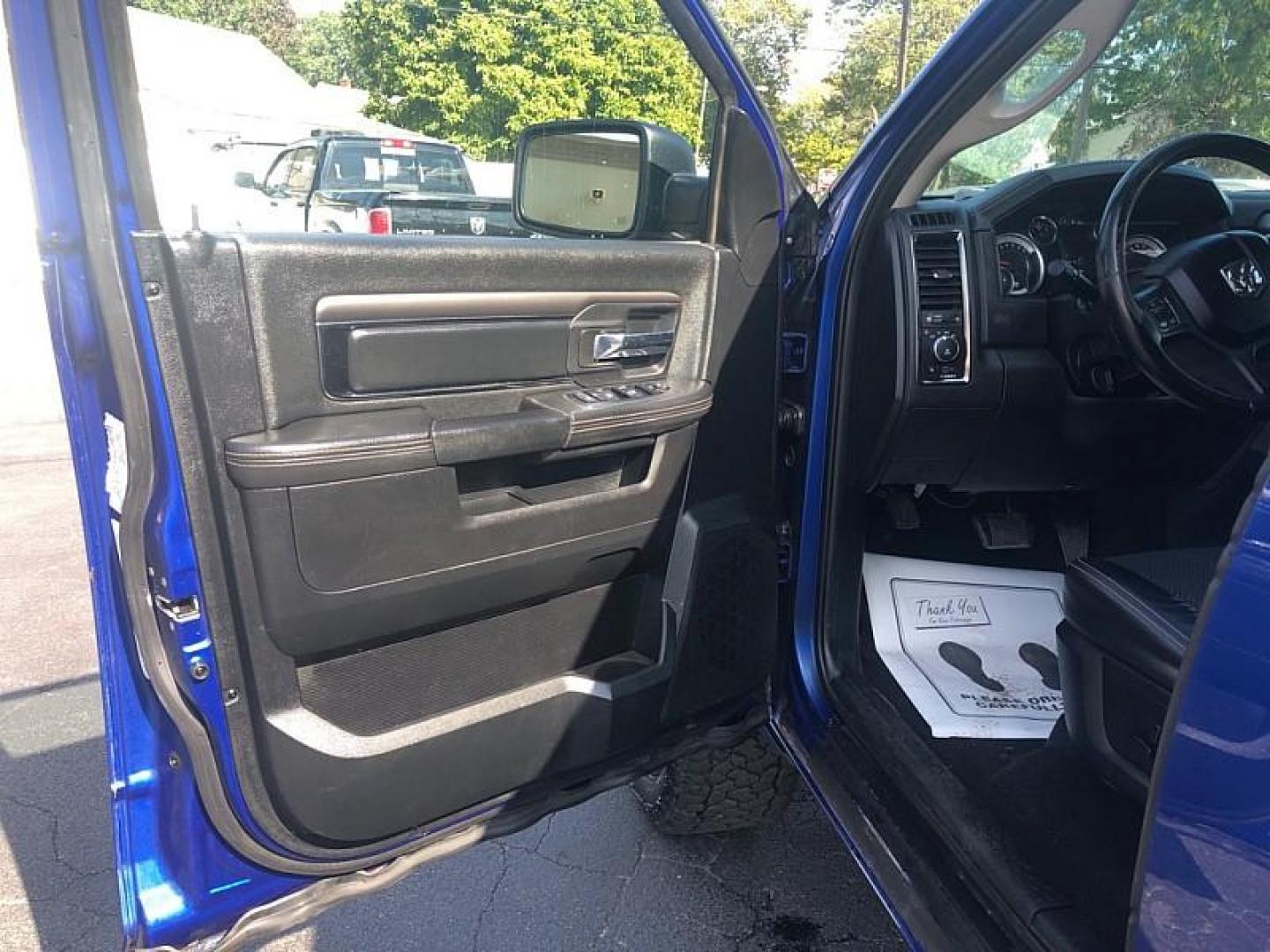 2014 BLUE /BLACK RAM 1500 Sport Quad Cab 4WD (1C6RR7HT9ES) with an 5.7L V8 OHV 16V engine, 6-Speed Automatic transmission, located at 3304 Woodville Road, Northwood, OH, 43619, (419) 210-8019, 41.612694, -83.480743 - We are #1 Auto Loan Dealer for Good Bad or No Credit we have hundreds of vehicles to choose from, stop on in or just fill out our online application to get approved for auto financing and see your credit score for free by visiting our website today. We have Low Payment Options and Terms Available - Photo#8