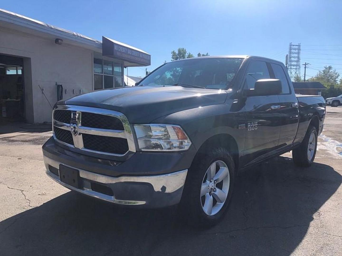 2014 GRAY /GREY RAM 1500 SLT Quad Cab 4WD (1C6RR7GT5ES) with an 5.7L V8 OHV 16V engine, 6-Speed Automatic transmission, located at 3304 Woodville Road, Northwood, OH, 43619, (419) 210-8019, 41.612694, -83.480743 - We are #1 Auto Loan Dealer for Good Bad or No Credit we have hundreds of vehicles to choose from, stop on in or just fill out our online application to get approved for auto financing and see your credit score for free by visiting our website today. We have Low Payment Options and Terms Available - Photo#0