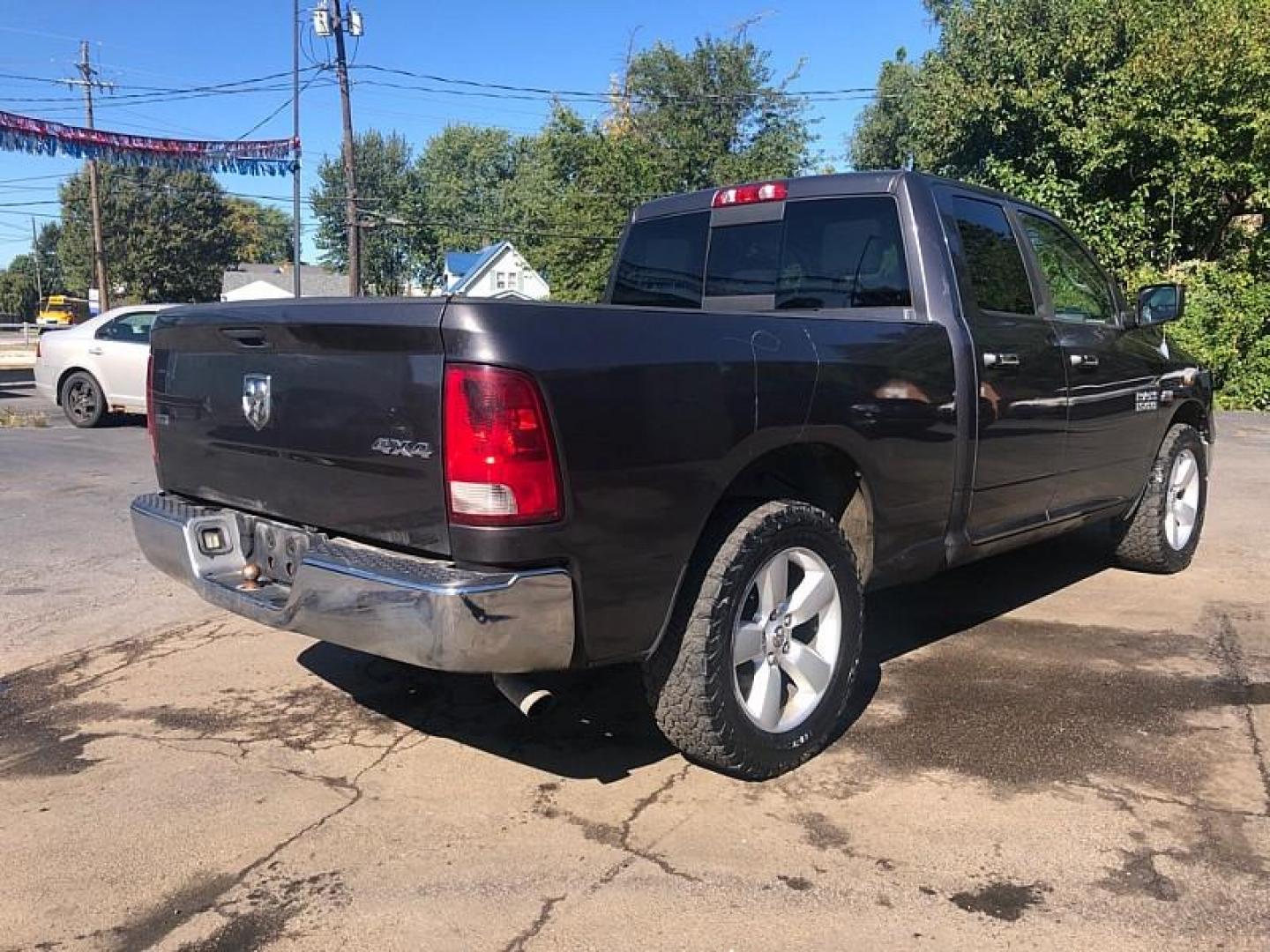 2014 GRAY /GREY RAM 1500 SLT Quad Cab 4WD (1C6RR7GT5ES) with an 5.7L V8 OHV 16V engine, 6-Speed Automatic transmission, located at 3304 Woodville Road, Northwood, OH, 43619, (419) 210-8019, 41.612694, -83.480743 - We are #1 Auto Loan Dealer for Good Bad or No Credit we have hundreds of vehicles to choose from, stop on in or just fill out our online application to get approved for auto financing and see your credit score for free by visiting our website today. We have Low Payment Options and Terms Available - Photo#4