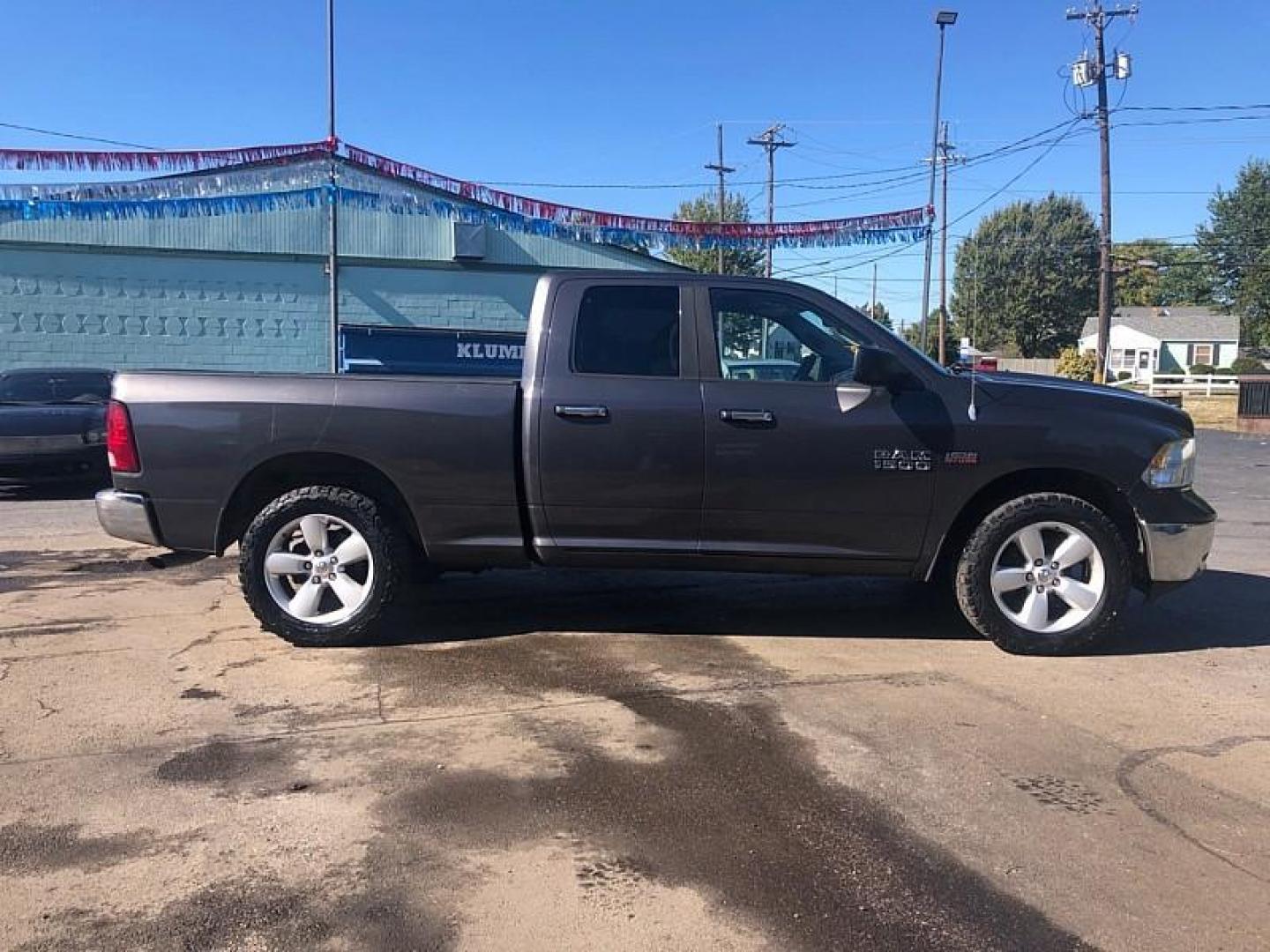 2014 GRAY /GREY RAM 1500 SLT Quad Cab 4WD (1C6RR7GT5ES) with an 5.7L V8 OHV 16V engine, 6-Speed Automatic transmission, located at 3304 Woodville Road, Northwood, OH, 43619, (419) 210-8019, 41.612694, -83.480743 - We are #1 Auto Loan Dealer for Good Bad or No Credit we have hundreds of vehicles to choose from, stop on in or just fill out our online application to get approved for auto financing and see your credit score for free by visiting our website today. We have Low Payment Options and Terms Available - Photo#5