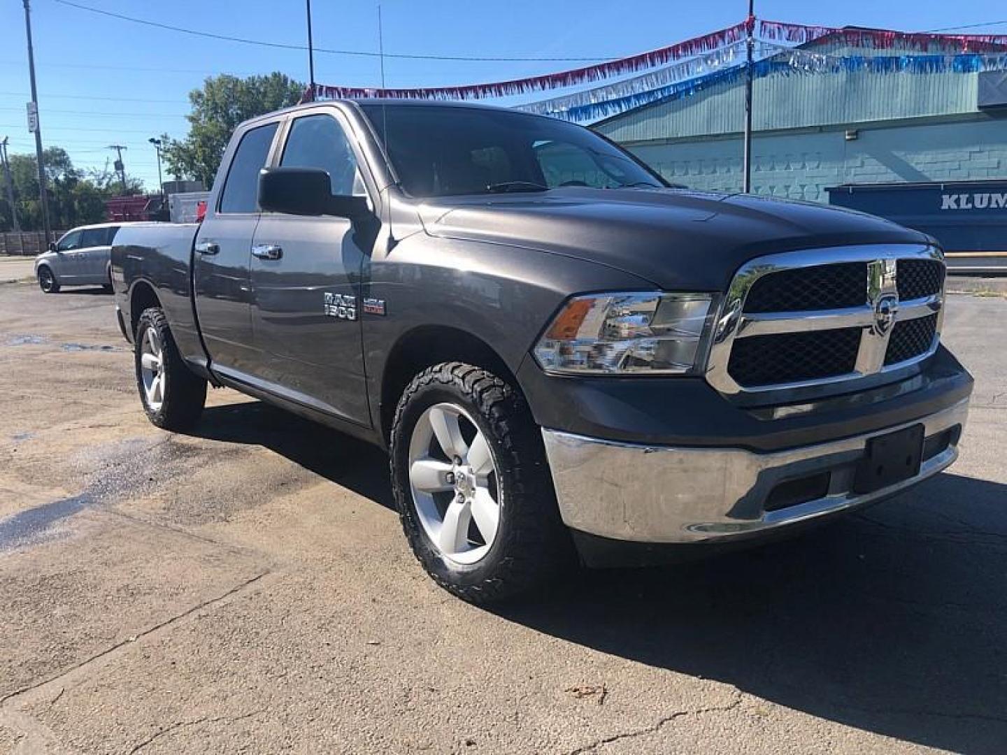 2014 GRAY /GREY RAM 1500 SLT Quad Cab 4WD (1C6RR7GT5ES) with an 5.7L V8 OHV 16V engine, 6-Speed Automatic transmission, located at 3304 Woodville Road, Northwood, OH, 43619, (419) 210-8019, 41.612694, -83.480743 - We are #1 Auto Loan Dealer for Good Bad or No Credit we have hundreds of vehicles to choose from, stop on in or just fill out our online application to get approved for auto financing and see your credit score for free by visiting our website today. We have Low Payment Options and Terms Available - Photo#6