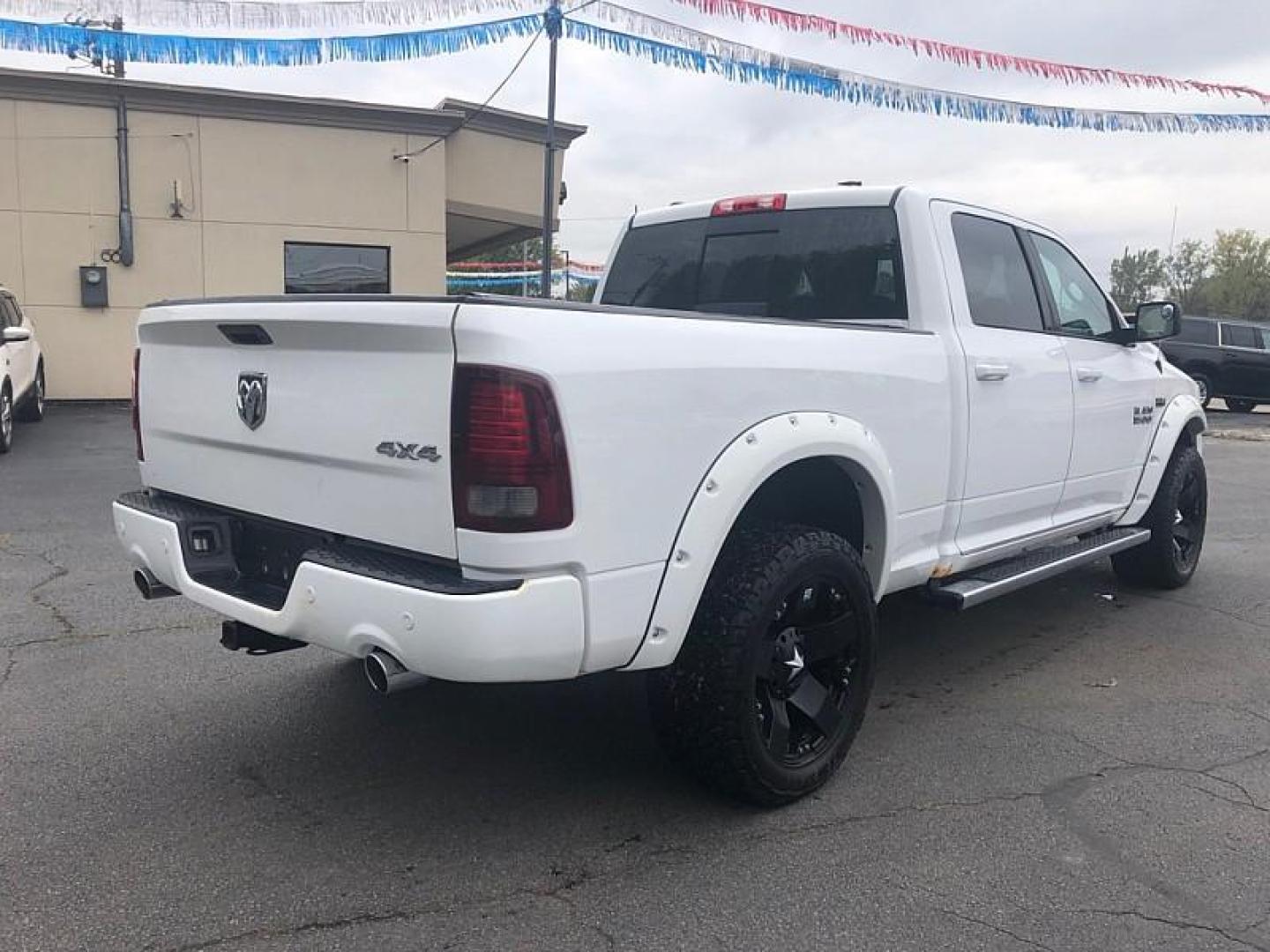 2015 WHITE /BLACK RAM 1500 Sport Crew Cab LWB 4WD (1C6RR7UT7FS) with an 5.7L V8 OHV 16V engine, 6-Speed Automatic transmission, located at 3304 Woodville Road, Northwood, OH, 43619, (419) 210-8019, 41.612694, -83.480743 - We are #1 Auto Loan Dealer for Good Bad or No Credit we have hundreds of vehicles to choose from, stop on in or just fill out our online application to get approved for auto financing and see your credit score for free by visiting our website today. We have Low Payment Options and Terms Available - Photo#4