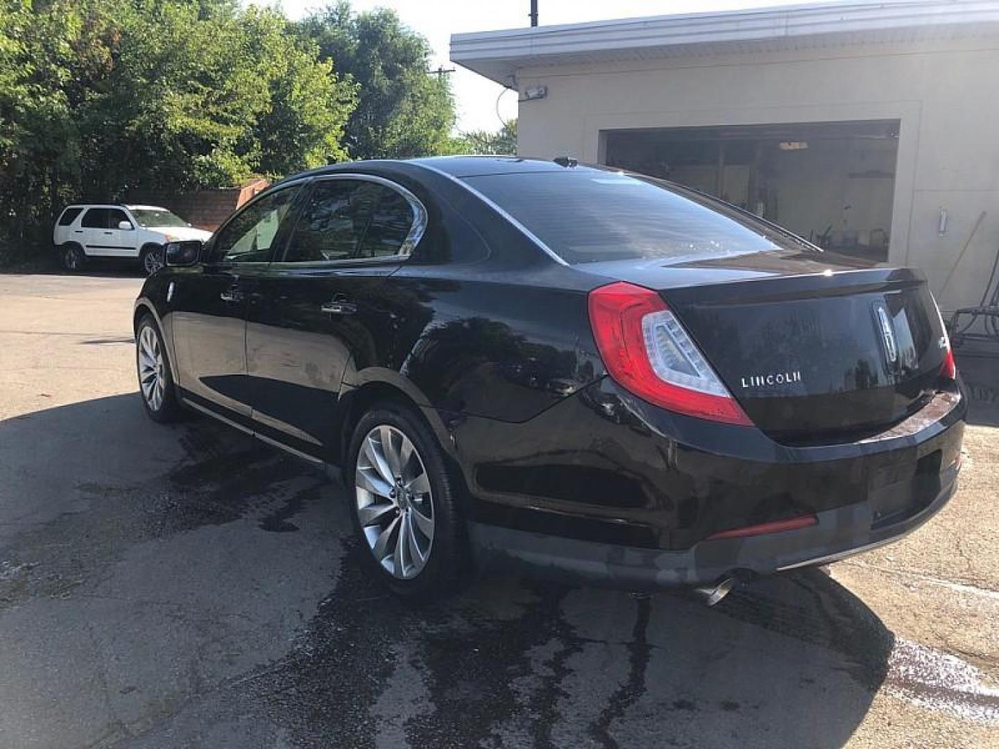 2013 BROWN /TAN Lincoln MKS FWD (1LNHL9DK1DG) with an 3.5L V6 DOHC 24V engine, 6-Speed Automatic transmission, located at 3304 Woodville Road, Northwood, OH, 43619, (419) 210-8019, 41.612694, -83.480743 - Photo#2