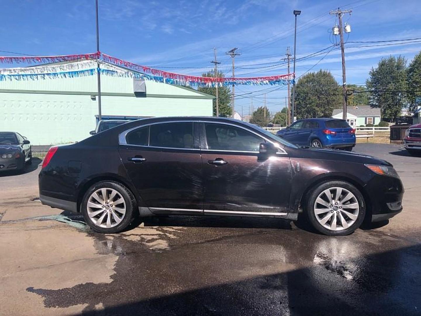 2013 BROWN /TAN Lincoln MKS FWD (1LNHL9DK1DG) with an 3.5L V6 DOHC 24V engine, 6-Speed Automatic transmission, located at 3304 Woodville Road, Northwood, OH, 43619, (419) 210-8019, 41.612694, -83.480743 - Photo#5