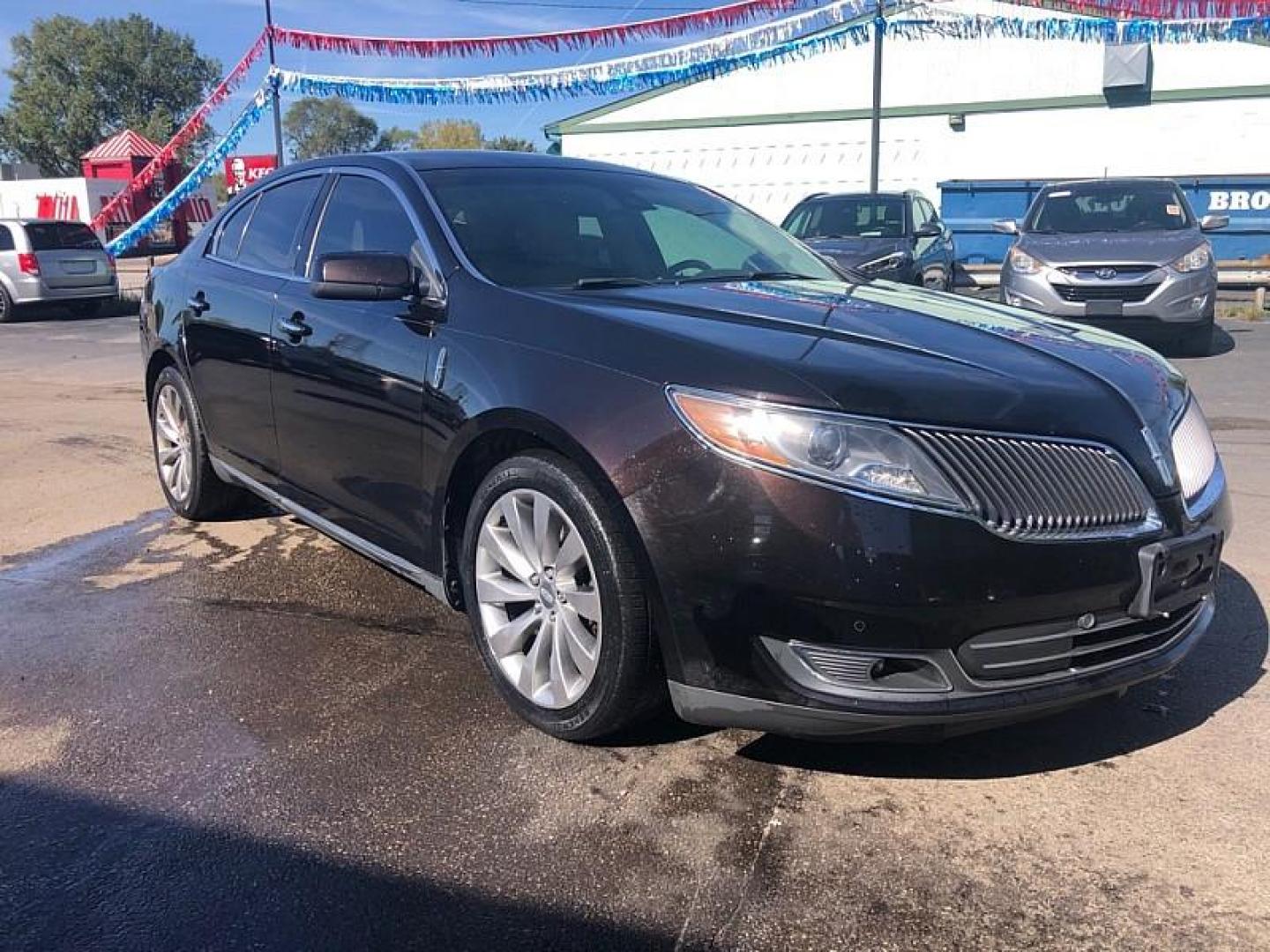 2013 BROWN /TAN Lincoln MKS FWD (1LNHL9DK1DG) with an 3.5L V6 DOHC 24V engine, 6-Speed Automatic transmission, located at 3304 Woodville Road, Northwood, OH, 43619, (419) 210-8019, 41.612694, -83.480743 - We are #1 Auto Loan Dealer for Good Bad or No Credit we have hundreds of vehicles to choose from, stop on in or just fill out our online application to get approved for auto financing and see your credit score for free by visiting our website today. We have Low Payment Options and Terms Available - Photo#6