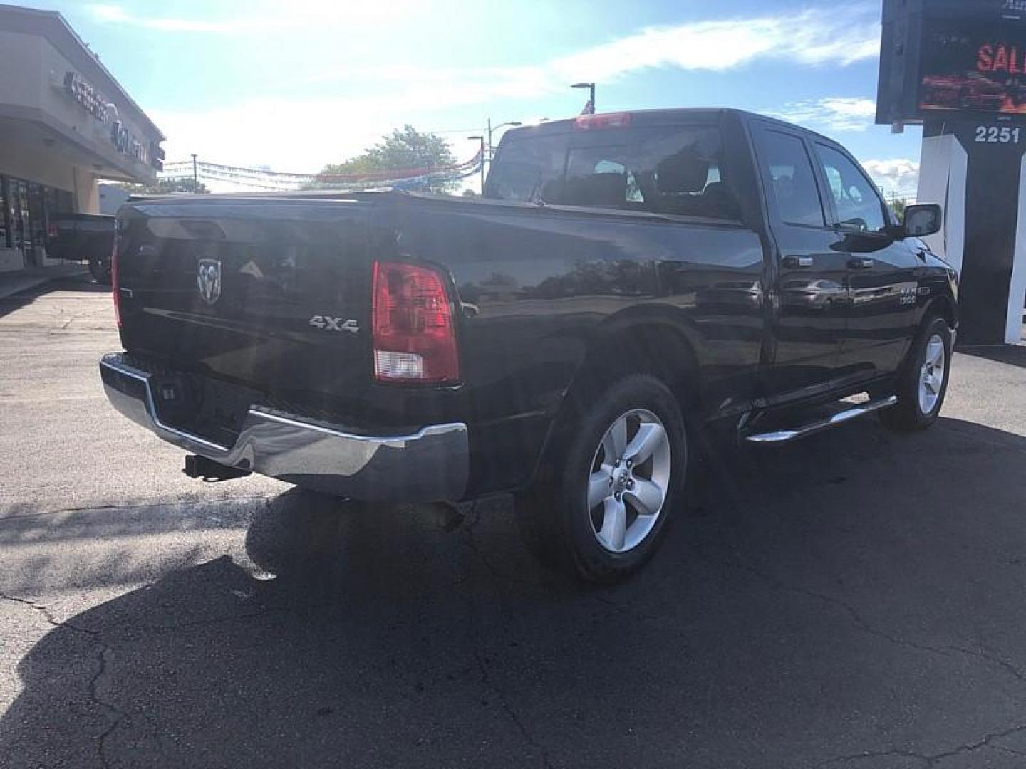 2015 BLACK /GREY RAM 1500 SLT Quad Cab 4WD (1C6RR7GM5FS) with an 3.0L V6 DOHC 24V DIESEL engine, 6-Speed Automatic transmission, located at 3304 Woodville Road, Northwood, OH, 43619, (419) 210-8019, 41.612694, -83.480743 - We are #1 Auto Loan Dealer for Good Bad or No Credit we have hundreds of vehicles to choose from, stop on in or just fill out our online application to get approved for auto financing and see your credit score for free by visiting our website today. We have Low Payment Options and Terms Available - Photo#4