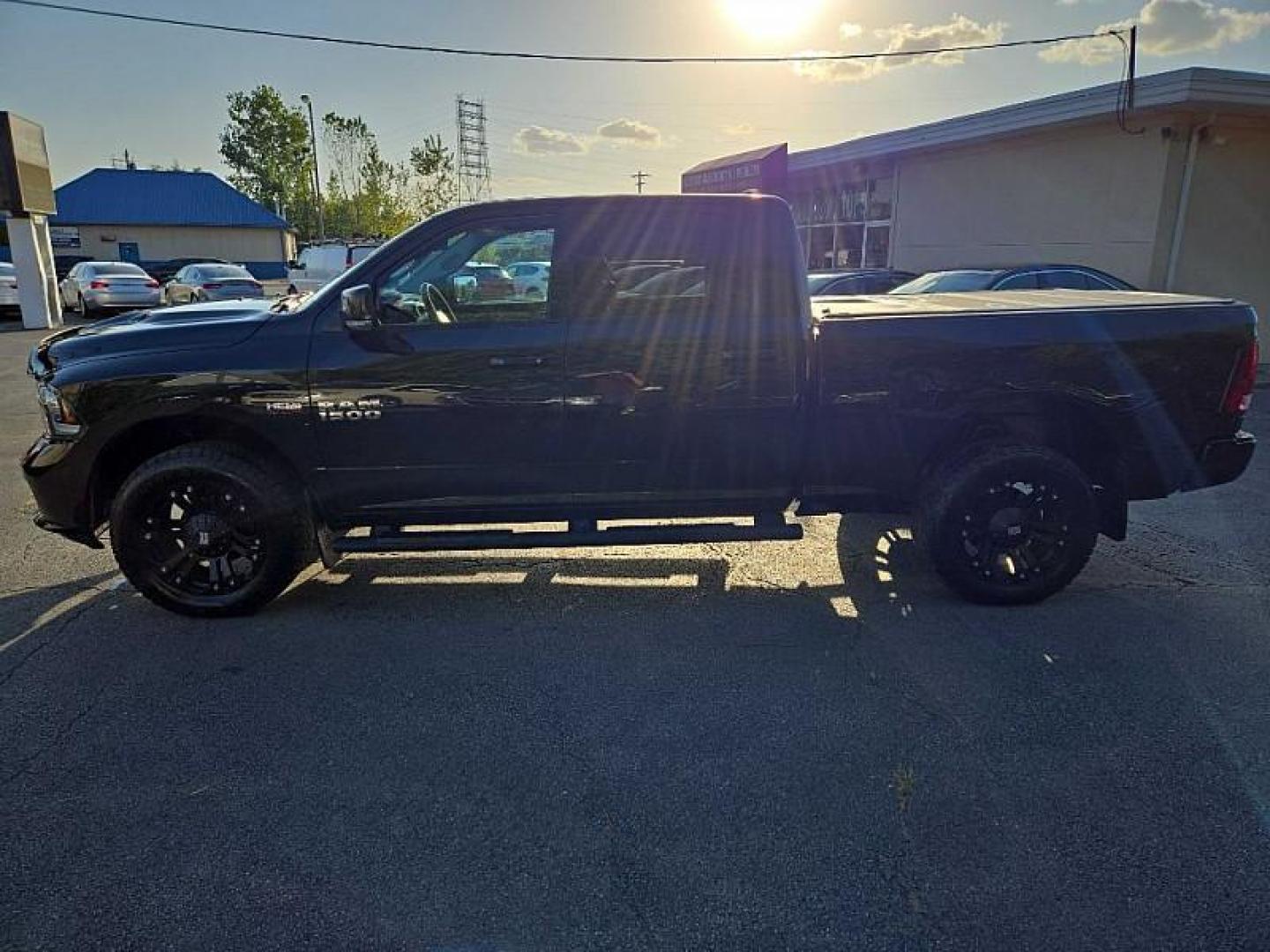 2016 BLACK /BLACK RAM 1500 Sport Crew Cab LWB 4WD (1C6RR7UT8GS) with an 5.7L V8 OHV 16V engine, 6A transmission, located at 3304 Woodville Road, Northwood, OH, 43619, (419) 210-8019, 41.612694, -83.480743 - We are #1 Auto Loan Dealer for Good Bad or No Credit we have hundreds of vehicles to choose from, stop on in or just fill out our online application to get approved for auto financing and see your credit score for free by visiting our website today. We have Low Payment Options and Terms Available - Photo#1