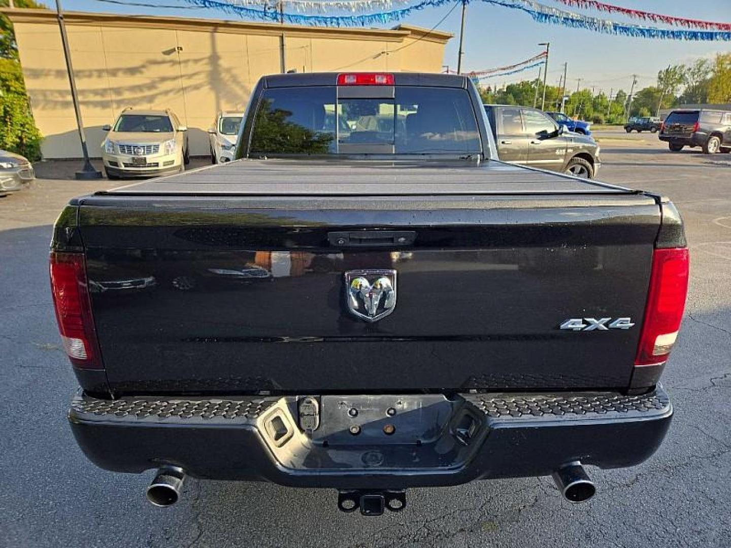 2016 BLACK /BLACK RAM 1500 Sport Crew Cab LWB 4WD (1C6RR7UT8GS) with an 5.7L V8 OHV 16V engine, 6A transmission, located at 3304 Woodville Road, Northwood, OH, 43619, (419) 210-8019, 41.612694, -83.480743 - We are #1 Auto Loan Dealer for Good Bad or No Credit we have hundreds of vehicles to choose from, stop on in or just fill out our online application to get approved for auto financing and see your credit score for free by visiting our website today. We have Low Payment Options and Terms Available - Photo#3