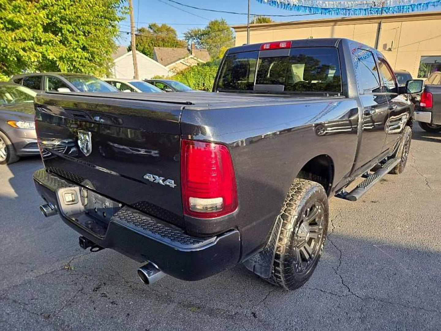 2016 BLACK /BLACK RAM 1500 Sport Crew Cab LWB 4WD (1C6RR7UT8GS) with an 5.7L V8 OHV 16V engine, 6A transmission, located at 3304 Woodville Road, Northwood, OH, 43619, (419) 210-8019, 41.612694, -83.480743 - We are #1 Auto Loan Dealer for Good Bad or No Credit we have hundreds of vehicles to choose from, stop on in or just fill out our online application to get approved for auto financing and see your credit score for free by visiting our website today. We have Low Payment Options and Terms Available - Photo#4