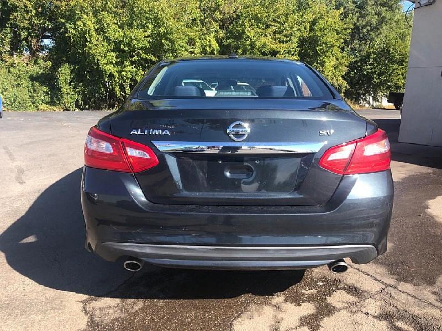 2016 BLACK /BLACK Nissan Altima 2.5 SL (1N4AL3APXGN) with an 2.5L L4 DOHC 16V engine, CVT transmission, located at 3304 Woodville Road, Northwood, OH, 43619, (419) 210-8019, 41.612694, -83.480743 - We are #1 Auto Loan Dealer for Good Bad or No Credit we have hundreds of vehicles to choose from, stop on in or just fill out our online application to get approved for auto financing and see your credit score for free by visiting our website today. We have Low Payment Options and Terms Available - Photo#3