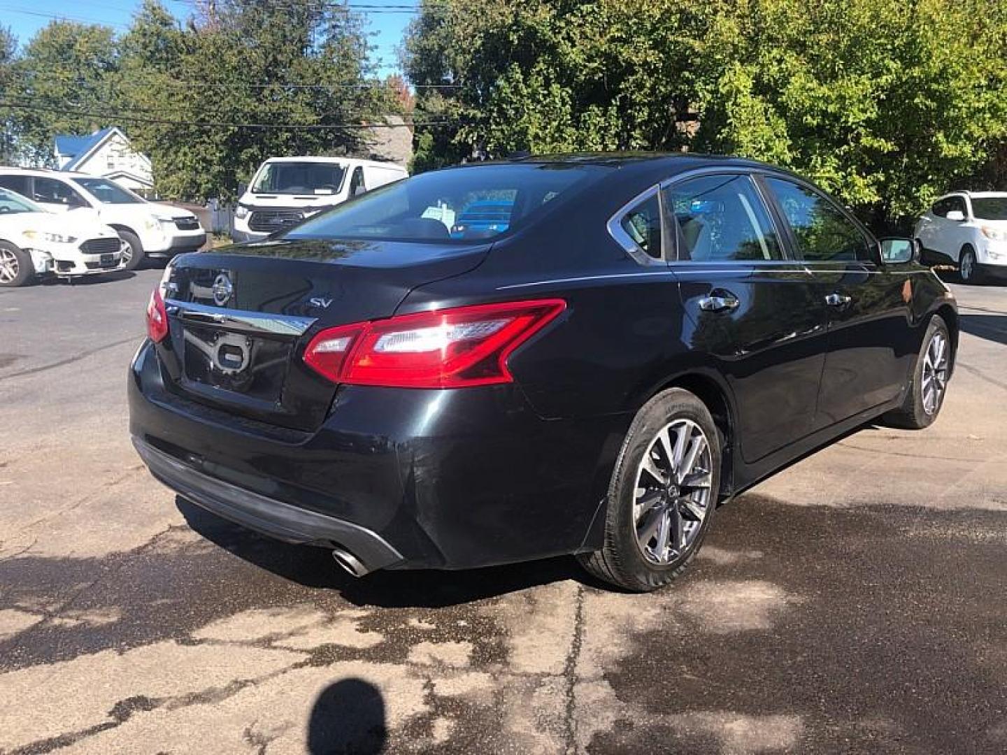 2016 BLACK /BLACK Nissan Altima 2.5 SL (1N4AL3APXGN) with an 2.5L L4 DOHC 16V engine, CVT transmission, located at 3304 Woodville Road, Northwood, OH, 43619, (419) 210-8019, 41.612694, -83.480743 - We are #1 Auto Loan Dealer for Good Bad or No Credit we have hundreds of vehicles to choose from, stop on in or just fill out our online application to get approved for auto financing and see your credit score for free by visiting our website today. We have Low Payment Options and Terms Available - Photo#4