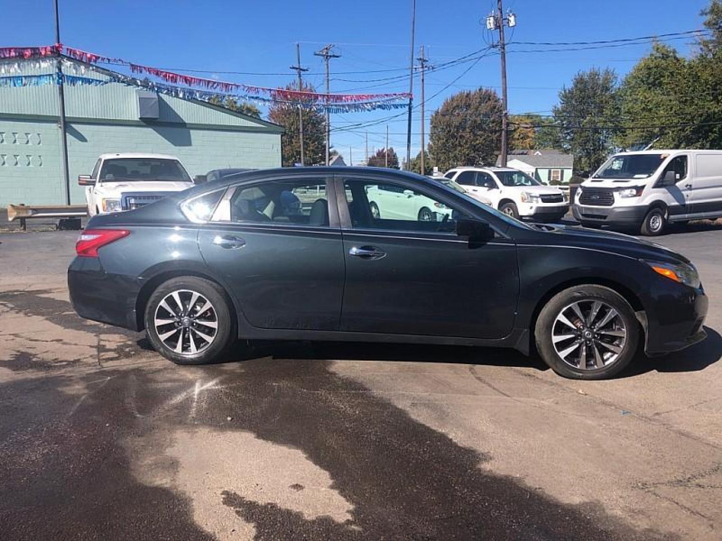 2016 BLACK /BLACK Nissan Altima 2.5 SL (1N4AL3APXGN) with an 2.5L L4 DOHC 16V engine, CVT transmission, located at 3304 Woodville Road, Northwood, OH, 43619, (419) 210-8019, 41.612694, -83.480743 - We are #1 Auto Loan Dealer for Good Bad or No Credit we have hundreds of vehicles to choose from, stop on in or just fill out our online application to get approved for auto financing and see your credit score for free by visiting our website today. We have Low Payment Options and Terms Available - Photo#5