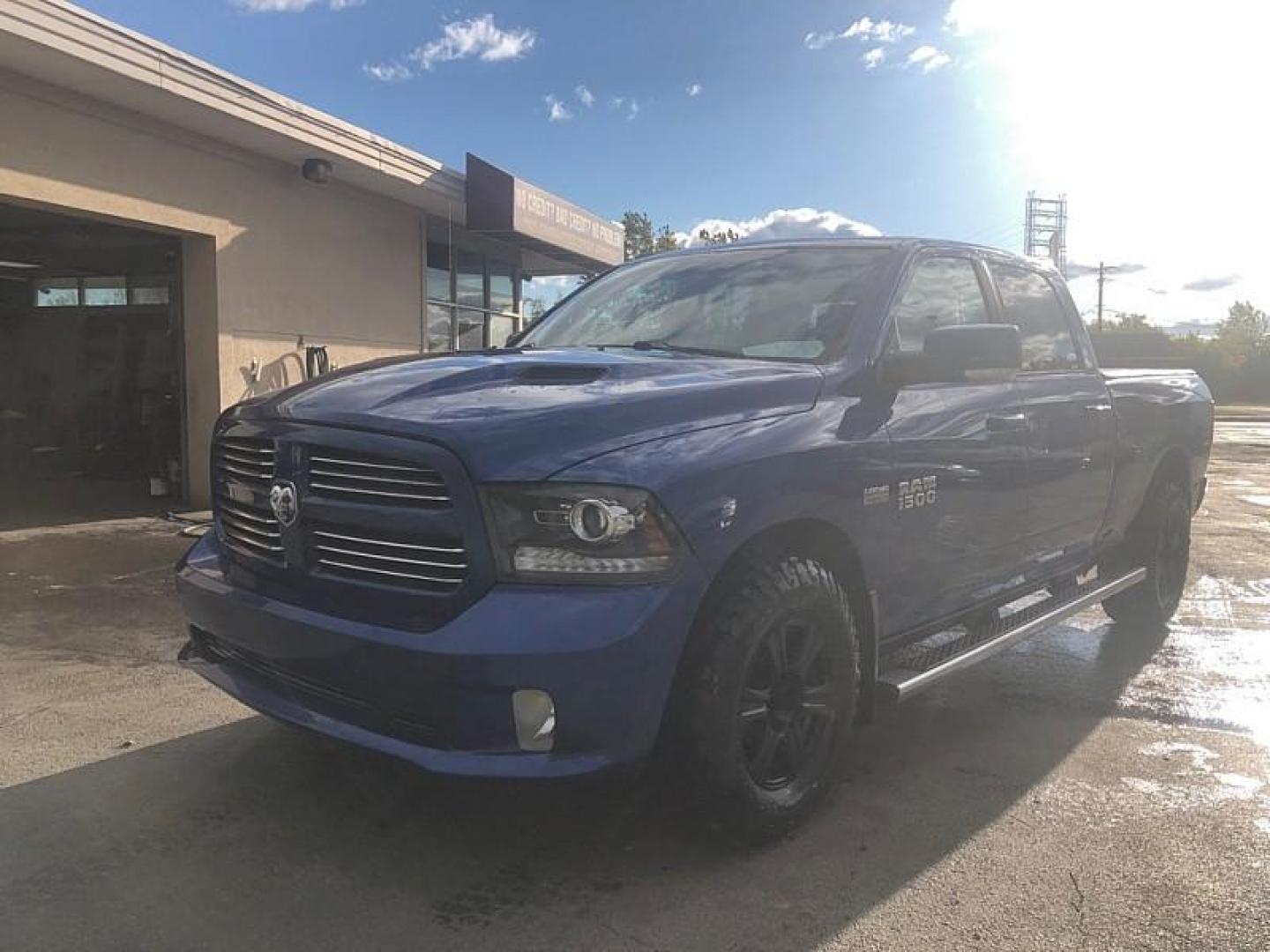 2015 BLUE /BLACK RAM 1500 Sport Crew Cab LWB 4WD (1C6RR7UT0FS) with an 5.7L V8 OHV 16V engine, 6-Speed Automatic transmission, located at 3304 Woodville Road, Northwood, OH, 43619, (419) 210-8019, 41.612694, -83.480743 - We are #1 Auto Loan Dealer for Good Bad or No Credit we have hundreds of vehicles to choose from, stop on in or just fill out our online application to get approved for auto financing and see your credit score for free by visiting our website today. We have Low Payment Options and Terms Available - Photo#0