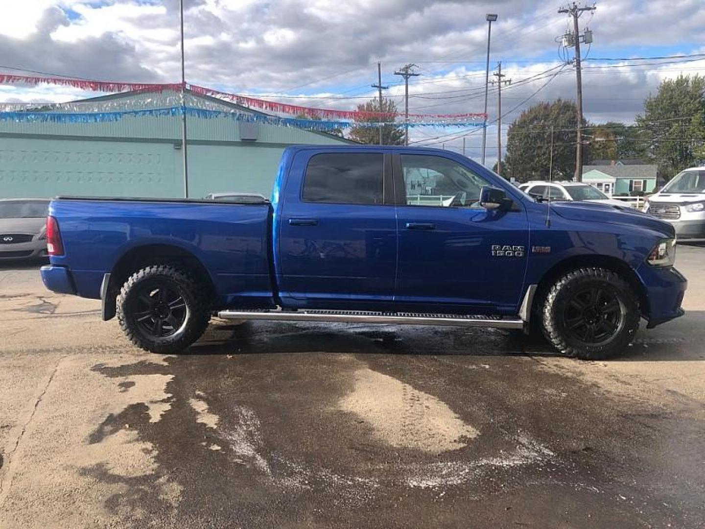 2015 BLUE /BLACK RAM 1500 Sport Crew Cab LWB 4WD (1C6RR7UT0FS) with an 5.7L V8 OHV 16V engine, 6-Speed Automatic transmission, located at 3304 Woodville Road, Northwood, OH, 43619, (419) 210-8019, 41.612694, -83.480743 - We are #1 Auto Loan Dealer for Good Bad or No Credit we have hundreds of vehicles to choose from, stop on in or just fill out our online application to get approved for auto financing and see your credit score for free by visiting our website today. We have Low Payment Options and Terms Available - Photo#5