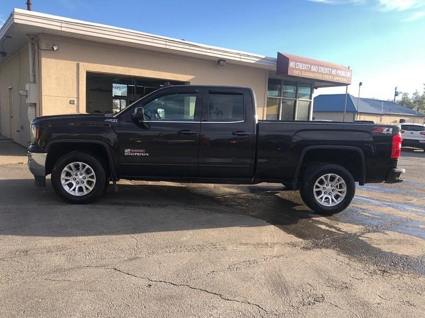 2018 BROWN /BLACK GMC Sierra 1500 SLE Double Cab 4WD (1GTV2MEC1JZ) with an 5.3L V8 OHV 16V engine, 6A transmission, located at 3304 Woodville Road, Northwood, OH, 43619, (419) 210-8019, 41.612694, -83.480743 - We are #1 Auto Loan Dealer for Good Bad or No Credit we have hundreds of vehicles to choose from, stop on in or just fill out our online application to get approved for auto financing and see your credit score for free by visiting our website today. We have Low Payment Options and Terms Available - Photo#1