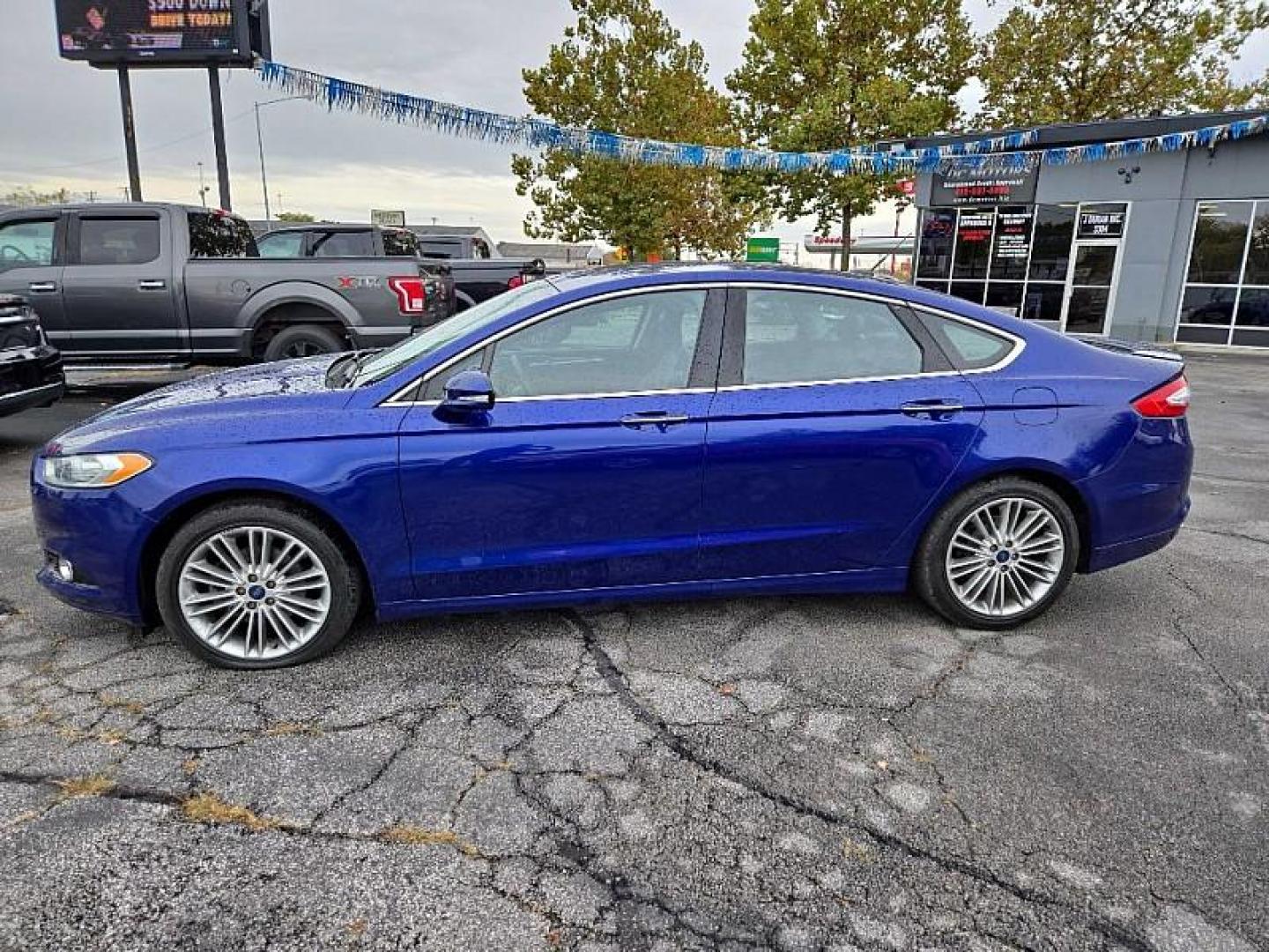 2014 BLUE /BLACK Ford Fusion Titanium (3FA6P0K97ER) with an 2.0L L4 DOHC 16V engine, Automatic 6-Spd transmission, located at 3304 Woodville Road, Northwood, OH, 43619, (419) 210-8019, 41.612694, -83.480743 - We are #1 Auto Loan Dealer for Good Bad or No Credit we have hundreds of vehicles to choose from, stop on in or just fill out our online application to get approved for auto financing and see your credit score for free by visiting our website today. We have Low Payment Options and Terms Available - Photo#30