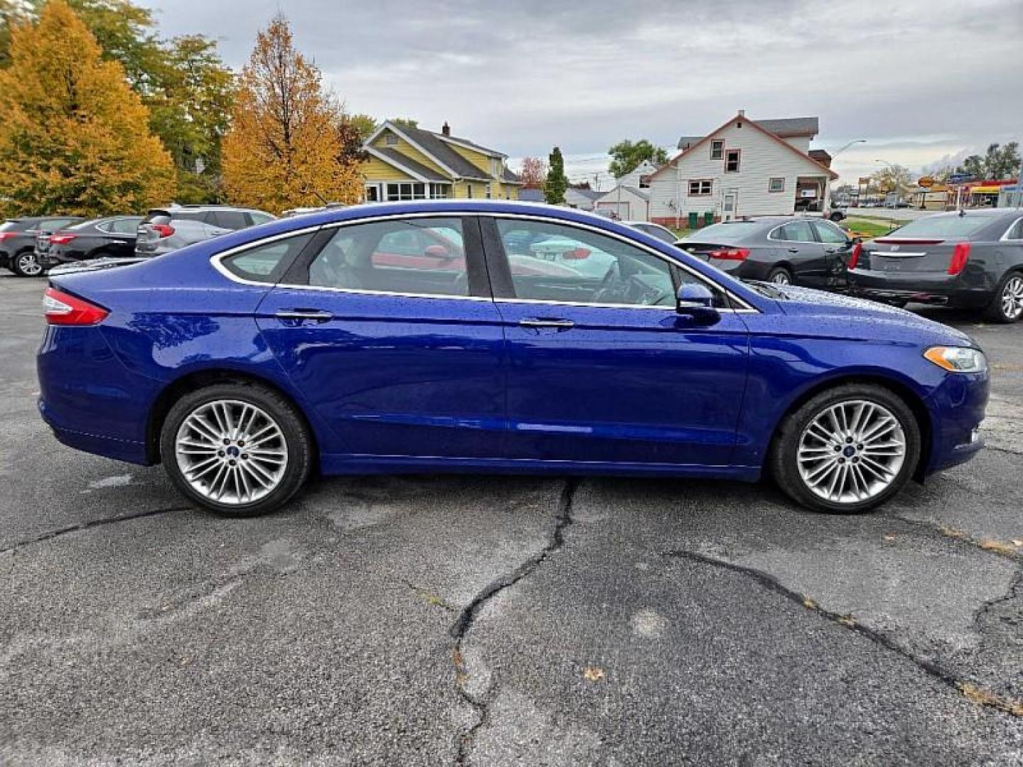 2014 BLUE /BLACK Ford Fusion Titanium (3FA6P0K97ER) with an 2.0L L4 DOHC 16V engine, Automatic 6-Spd transmission, located at 3304 Woodville Road, Northwood, OH, 43619, (419) 210-8019, 41.612694, -83.480743 - We are #1 Auto Loan Dealer for Good Bad or No Credit we have hundreds of vehicles to choose from, stop on in or just fill out our online application to get approved for auto financing and see your credit score for free by visiting our website today. We have Low Payment Options and Terms Available - Photo#33