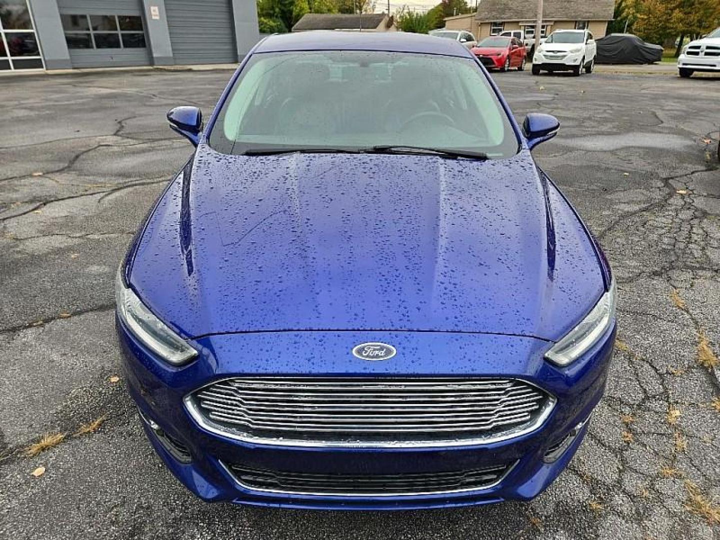 2014 BLUE /BLACK Ford Fusion Titanium (3FA6P0K97ER) with an 2.0L L4 DOHC 16V engine, Automatic 6-Spd transmission, located at 3304 Woodville Road, Northwood, OH, 43619, (419) 210-8019, 41.612694, -83.480743 - We are #1 Auto Loan Dealer for Good Bad or No Credit we have hundreds of vehicles to choose from, stop on in or just fill out our online application to get approved for auto financing and see your credit score for free by visiting our website today. We have Low Payment Options and Terms Available - Photo#35