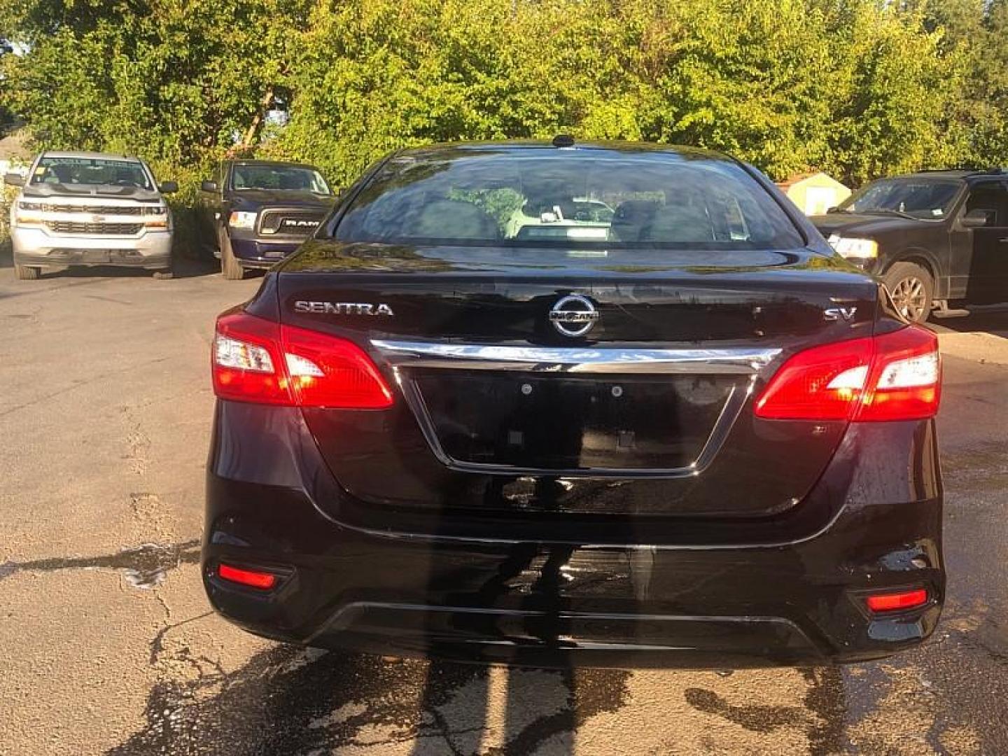 2019 BLACK /BLACK Nissan Sentra S CVT (3N1AB7AP9KY) with an 1.8L L4 SFI DOHC 16V engine, CVT transmission, located at 3304 Woodville Road, Northwood, OH, 43619, (419) 210-8019, 41.612694, -83.480743 - We are #1 Auto Loan Dealer for Good Bad or No Credit we have hundreds of vehicles to choose from, stop on in or just fill out our online application to get approved for auto financing and see your credit score for free by visiting our website today. We have Low Payment Options and Terms Available - Photo#3