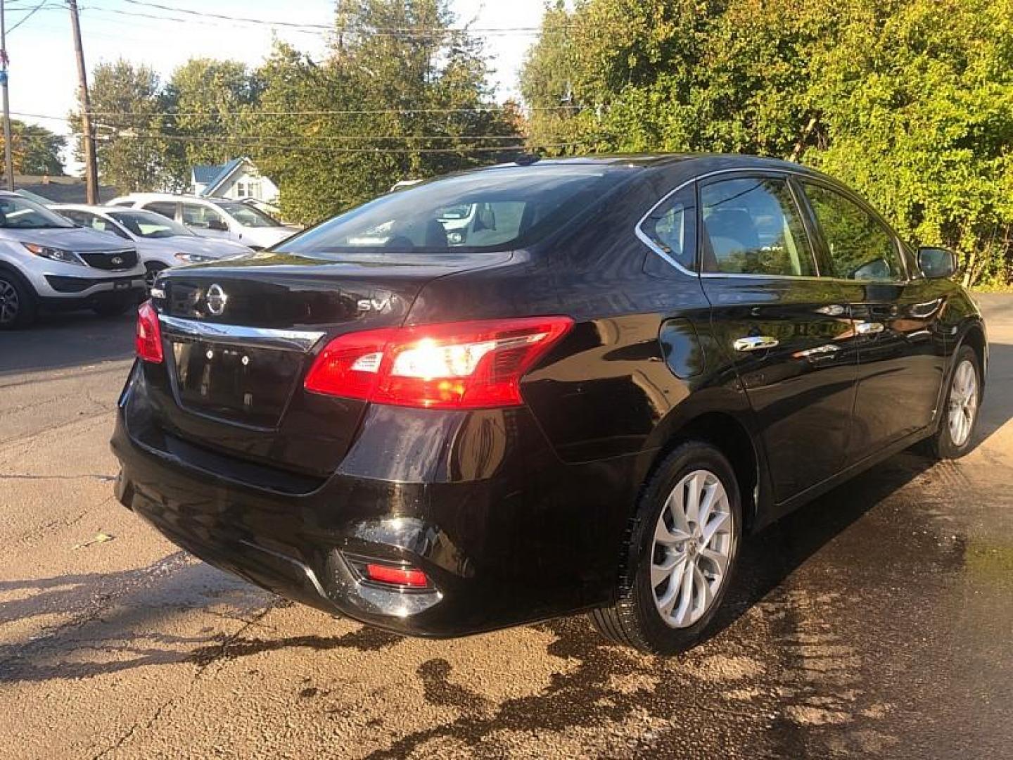 2019 BLACK /BLACK Nissan Sentra S CVT (3N1AB7AP9KY) with an 1.8L L4 SFI DOHC 16V engine, CVT transmission, located at 3304 Woodville Road, Northwood, OH, 43619, (419) 210-8019, 41.612694, -83.480743 - We are #1 Auto Loan Dealer for Good Bad or No Credit we have hundreds of vehicles to choose from, stop on in or just fill out our online application to get approved for auto financing and see your credit score for free by visiting our website today. We have Low Payment Options and Terms Available - Photo#4