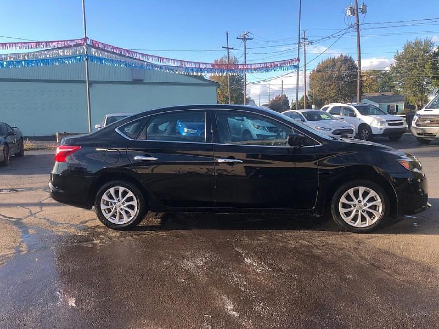 2019 BLACK /BLACK Nissan Sentra S CVT (3N1AB7AP9KY) with an 1.8L L4 SFI DOHC 16V engine, CVT transmission, located at 3304 Woodville Road, Northwood, OH, 43619, (419) 210-8019, 41.612694, -83.480743 - We are #1 Auto Loan Dealer for Good Bad or No Credit we have hundreds of vehicles to choose from, stop on in or just fill out our online application to get approved for auto financing and see your credit score for free by visiting our website today. We have Low Payment Options and Terms Available - Photo#5