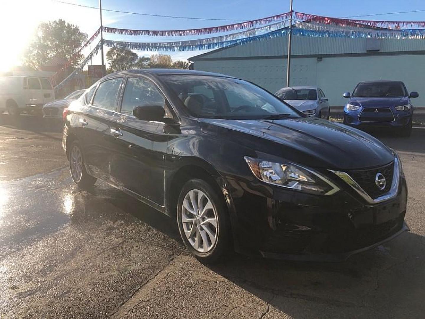 2019 BLACK /BLACK Nissan Sentra S CVT (3N1AB7AP9KY) with an 1.8L L4 SFI DOHC 16V engine, CVT transmission, located at 3304 Woodville Road, Northwood, OH, 43619, (419) 210-8019, 41.612694, -83.480743 - We are #1 Auto Loan Dealer for Good Bad or No Credit we have hundreds of vehicles to choose from, stop on in or just fill out our online application to get approved for auto financing and see your credit score for free by visiting our website today. We have Low Payment Options and Terms Available - Photo#6